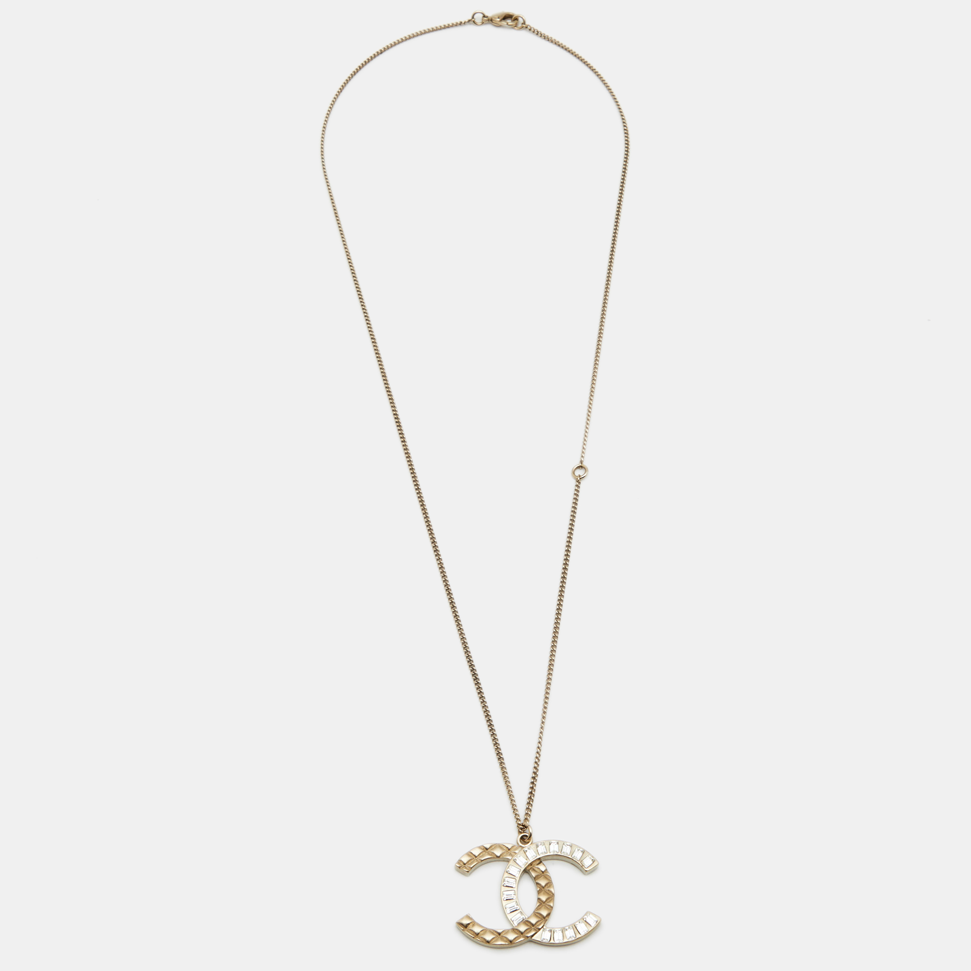 

Chanel Pale Gold Tone Baguette Crystal CC Pendant Necklace