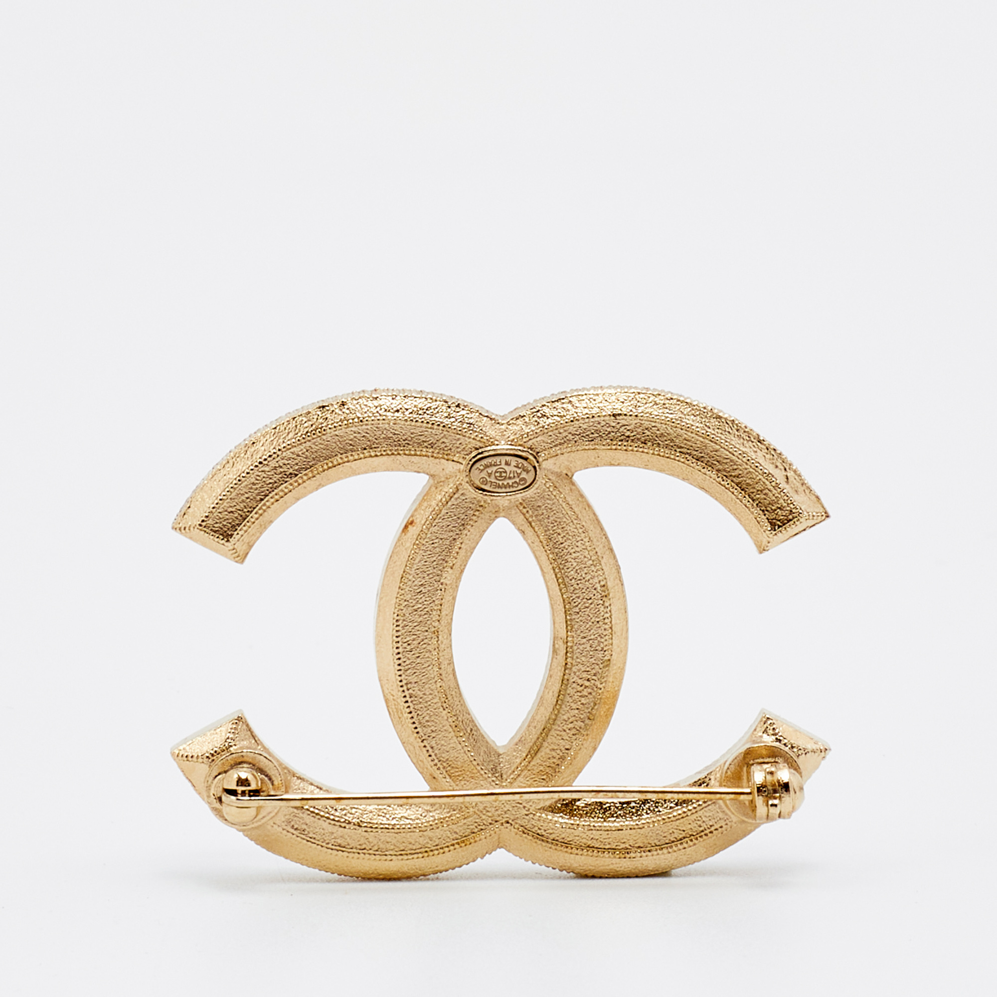 

Chanel Gold Tone Faux Pearl CC Pin Brooch