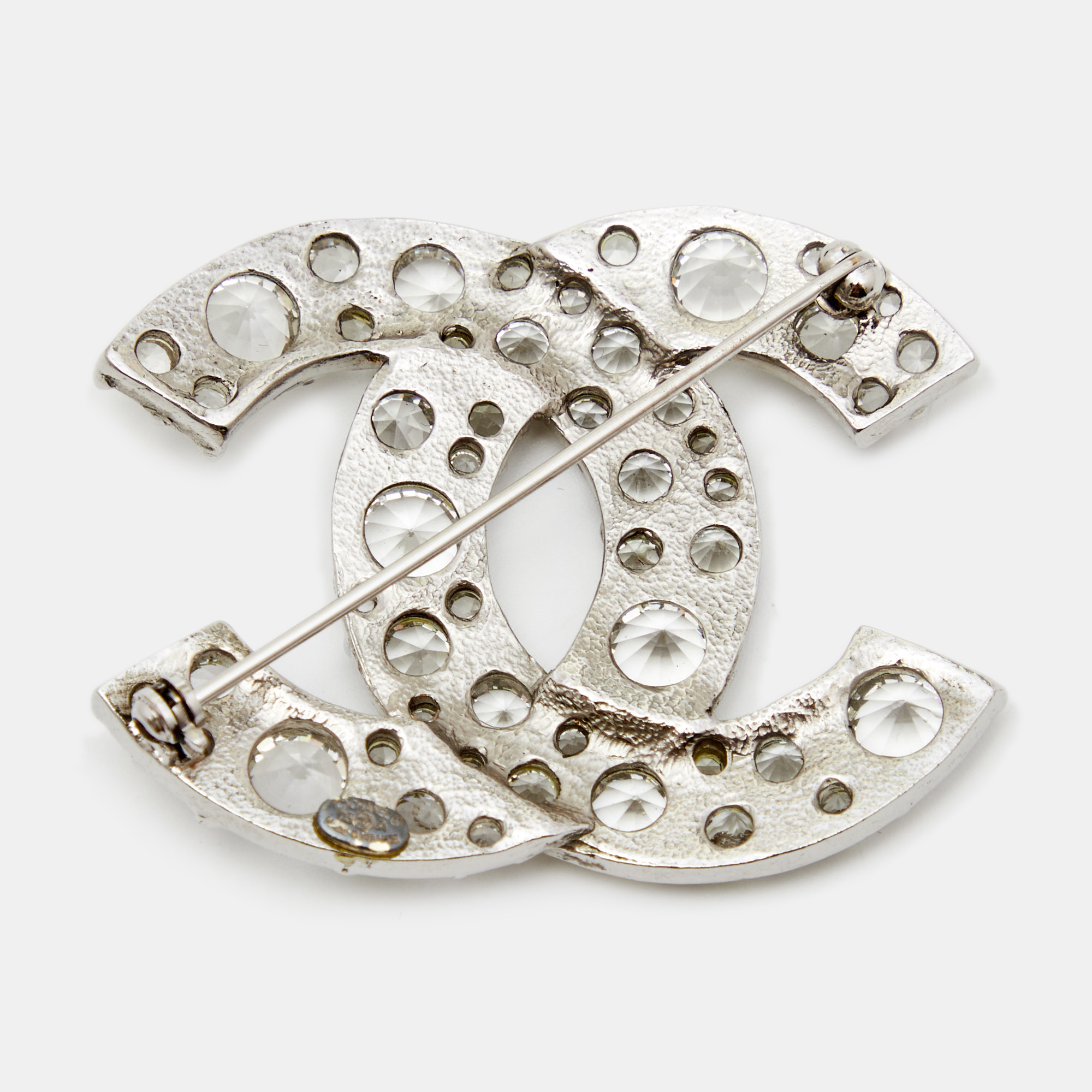 

Chanel Silver Tone & Crystal CC Pin Brooch