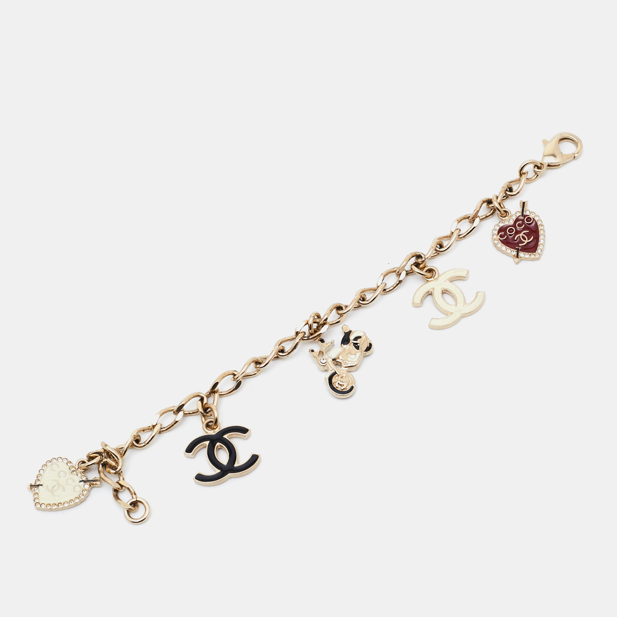 

Chanel CC Coco Rider Crystal Enamel Gold Tone Multi Charm Bracelet