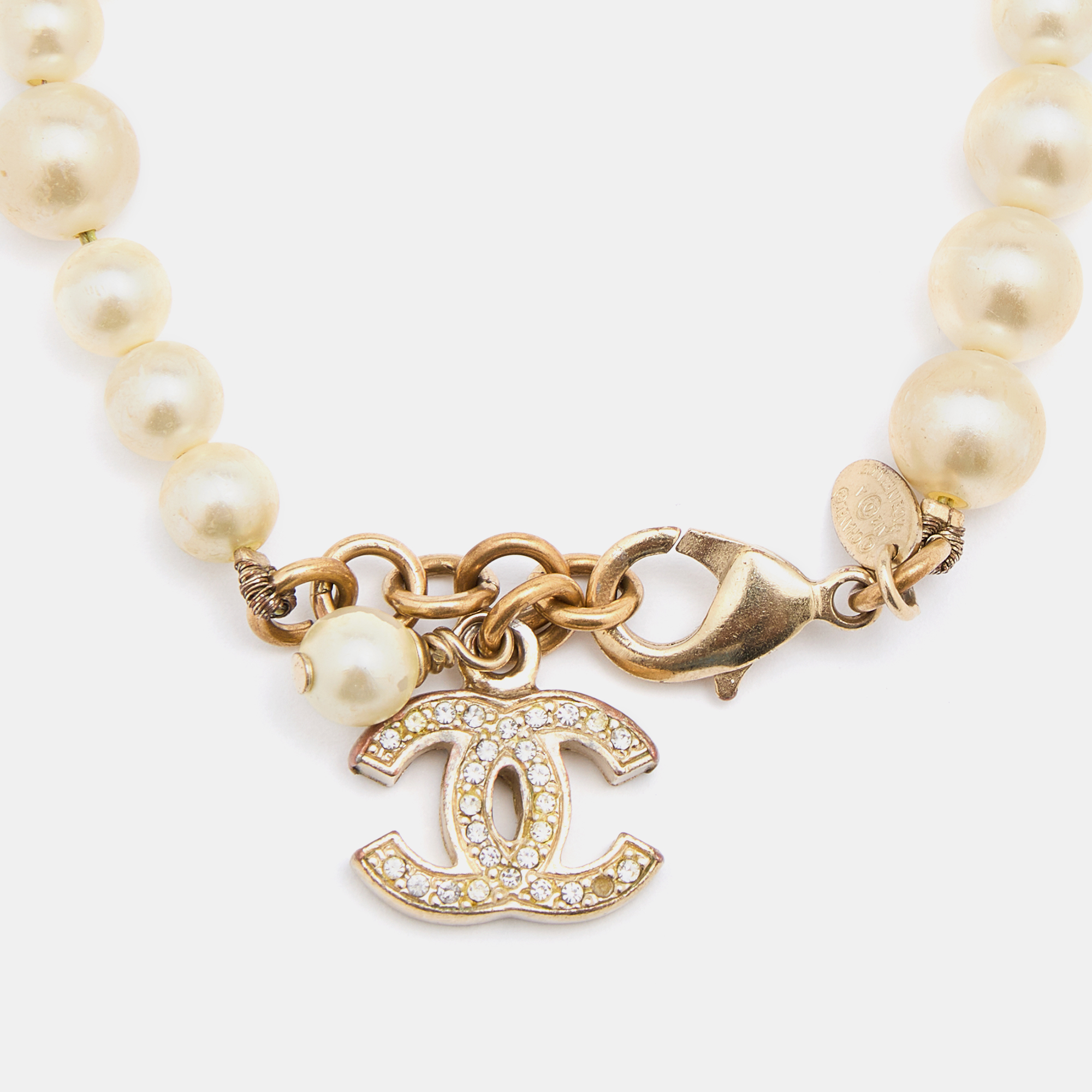 

Chanel Gold Tone CC Charm Faux Pearl Bracelet, White