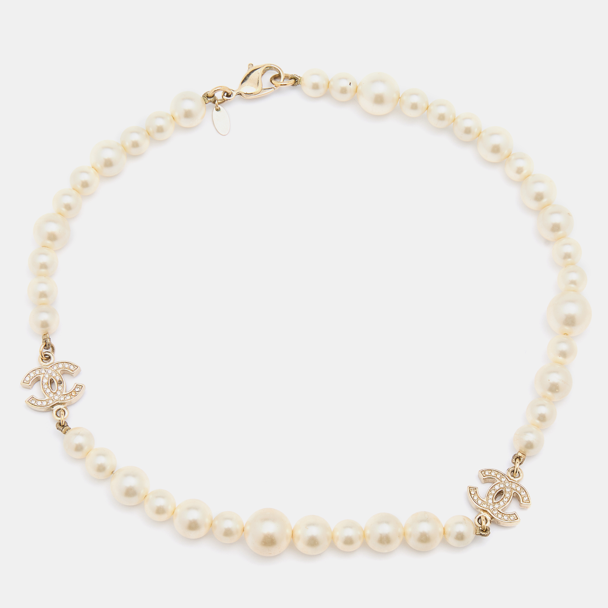 

Chanel Gold Tone Crystal CC Charm Faux Pearl Short Necklace, White