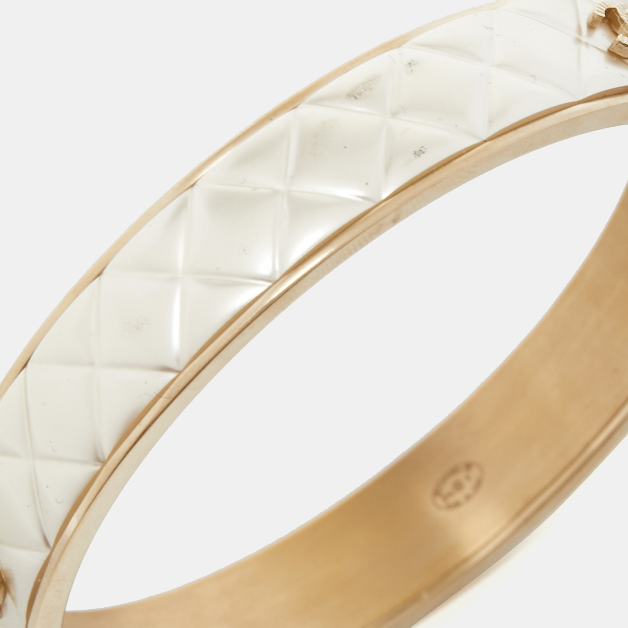 

Chanel CC Composite Gold Tone Bangle Bracelet