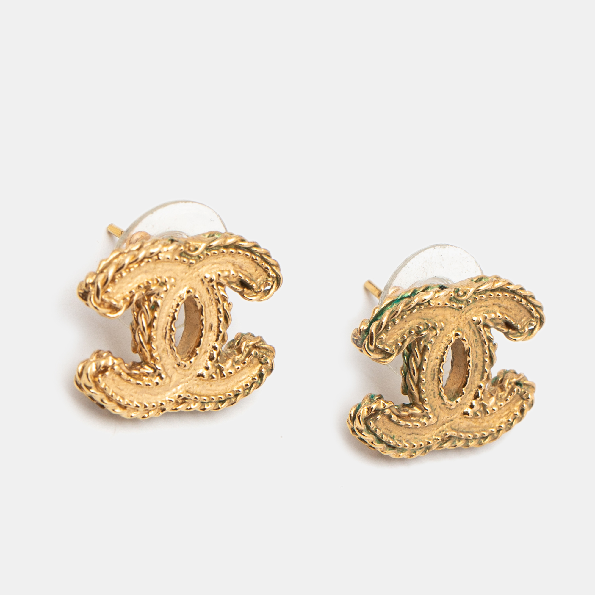 

Chanel Gold Tone Twist Detail CC Stud Earrings