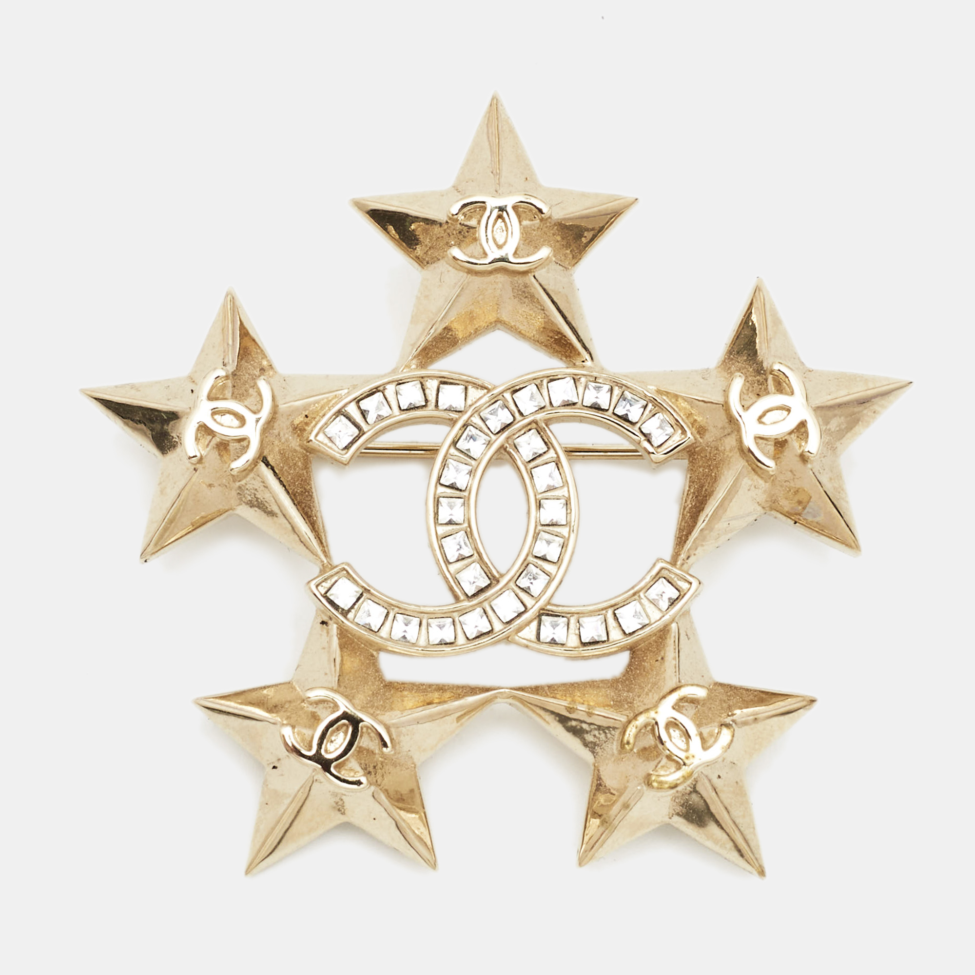 Pre-owned Chanel Gold Tone Baguette Crystal Cc Star Pin Brooch