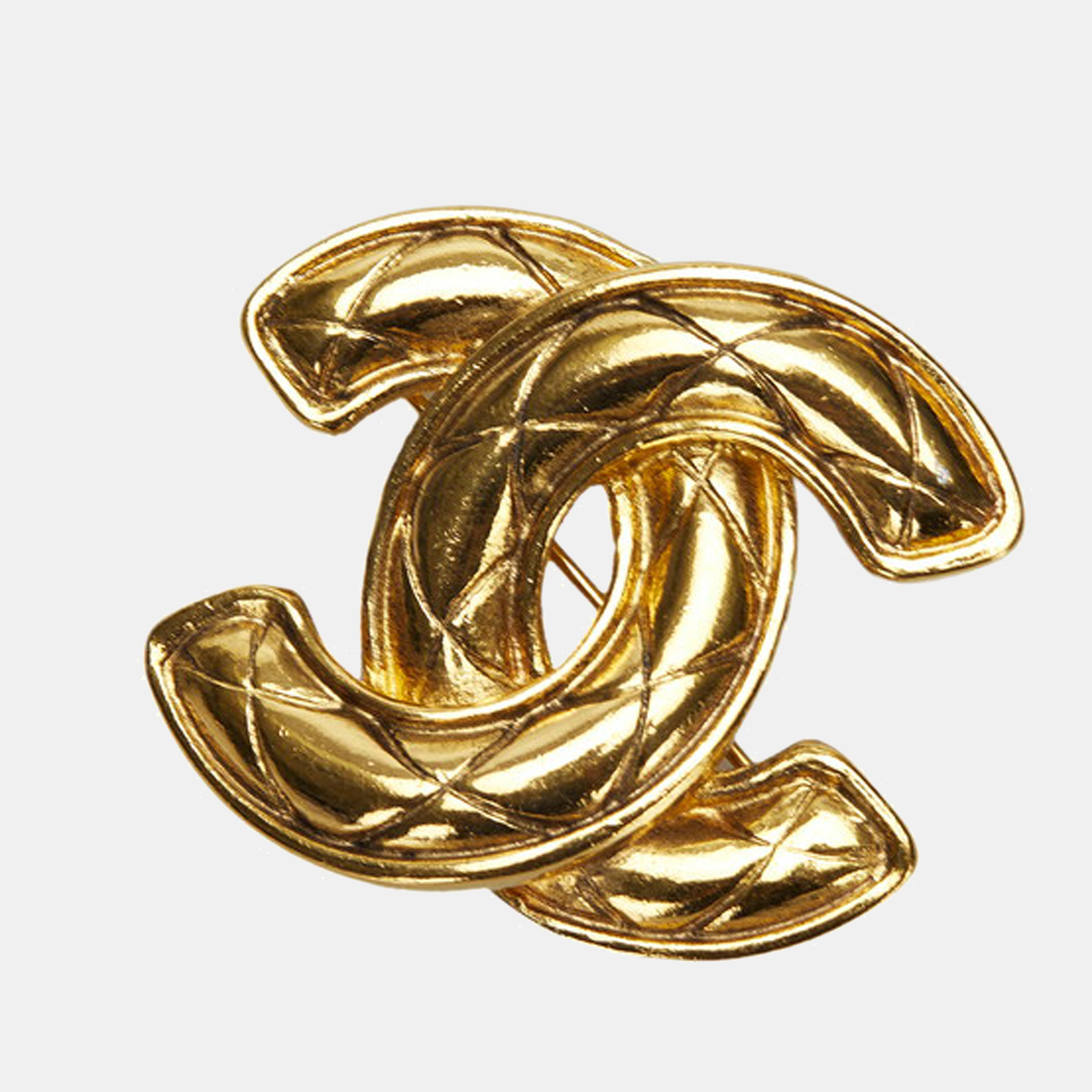

Chanel Yellow Gold Tone Metal Quilted CC Brooch