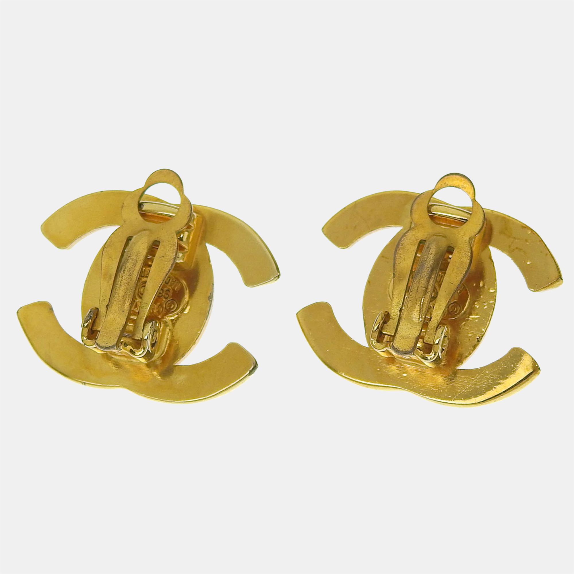 

Chanel Gold Metal CC Turnlock Clip On Earrings