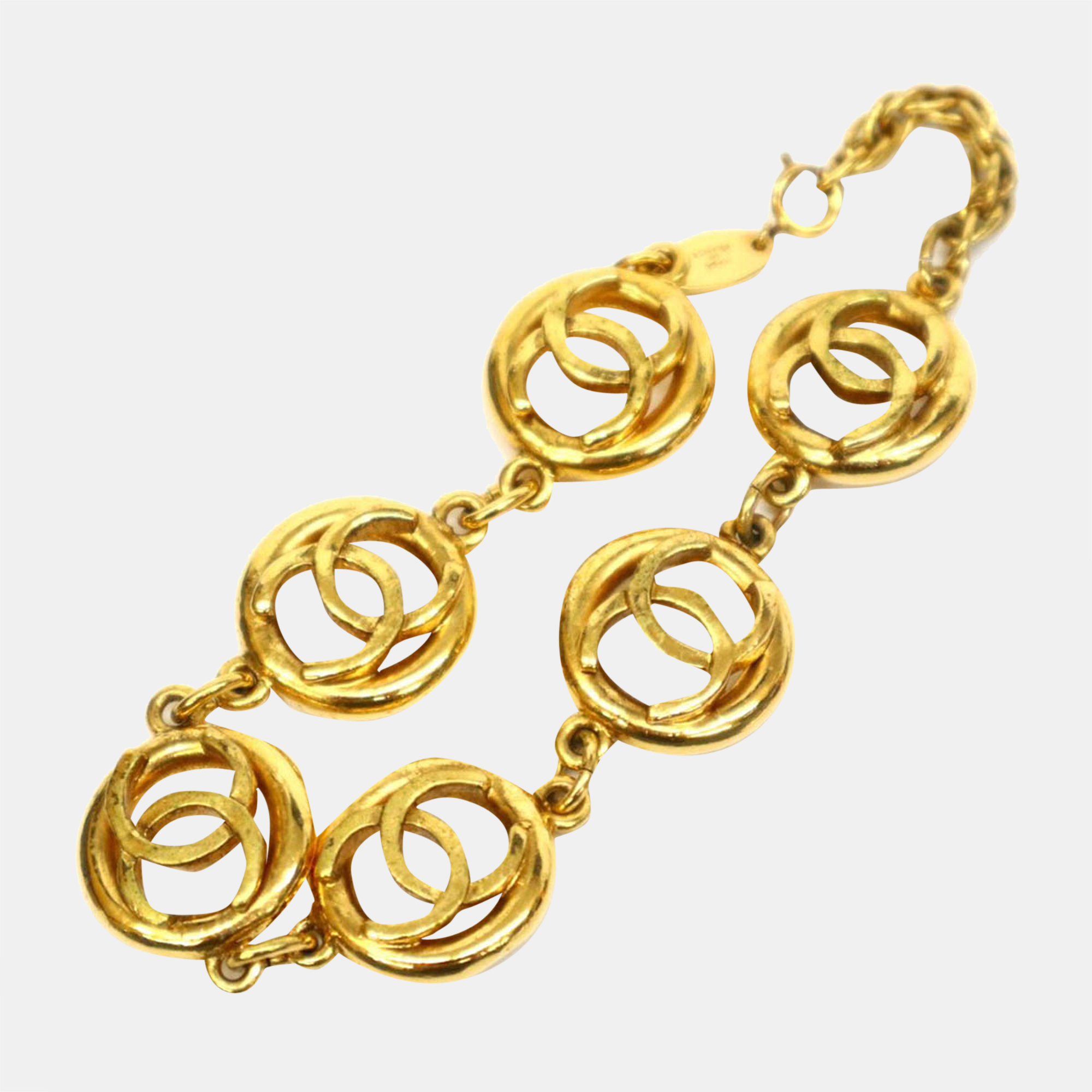 

Chanel Gold Metal Round Logo CC Bracelet Bracelet