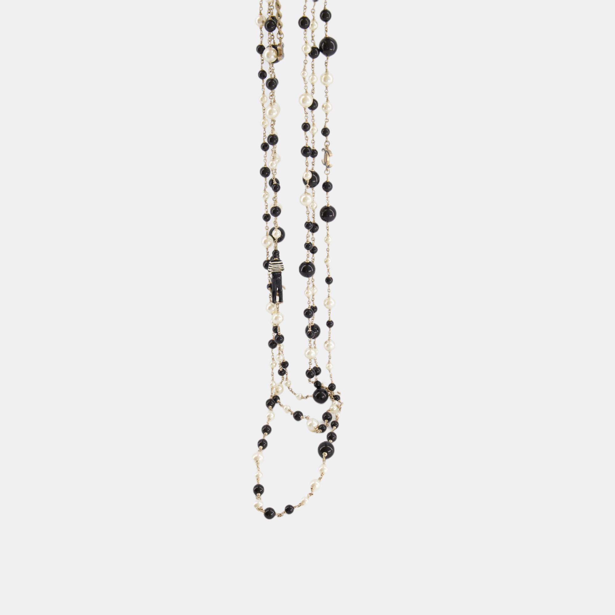 

Chanel Black and White Pearl Glass Necklace with Gold Chain and CC Logo Details