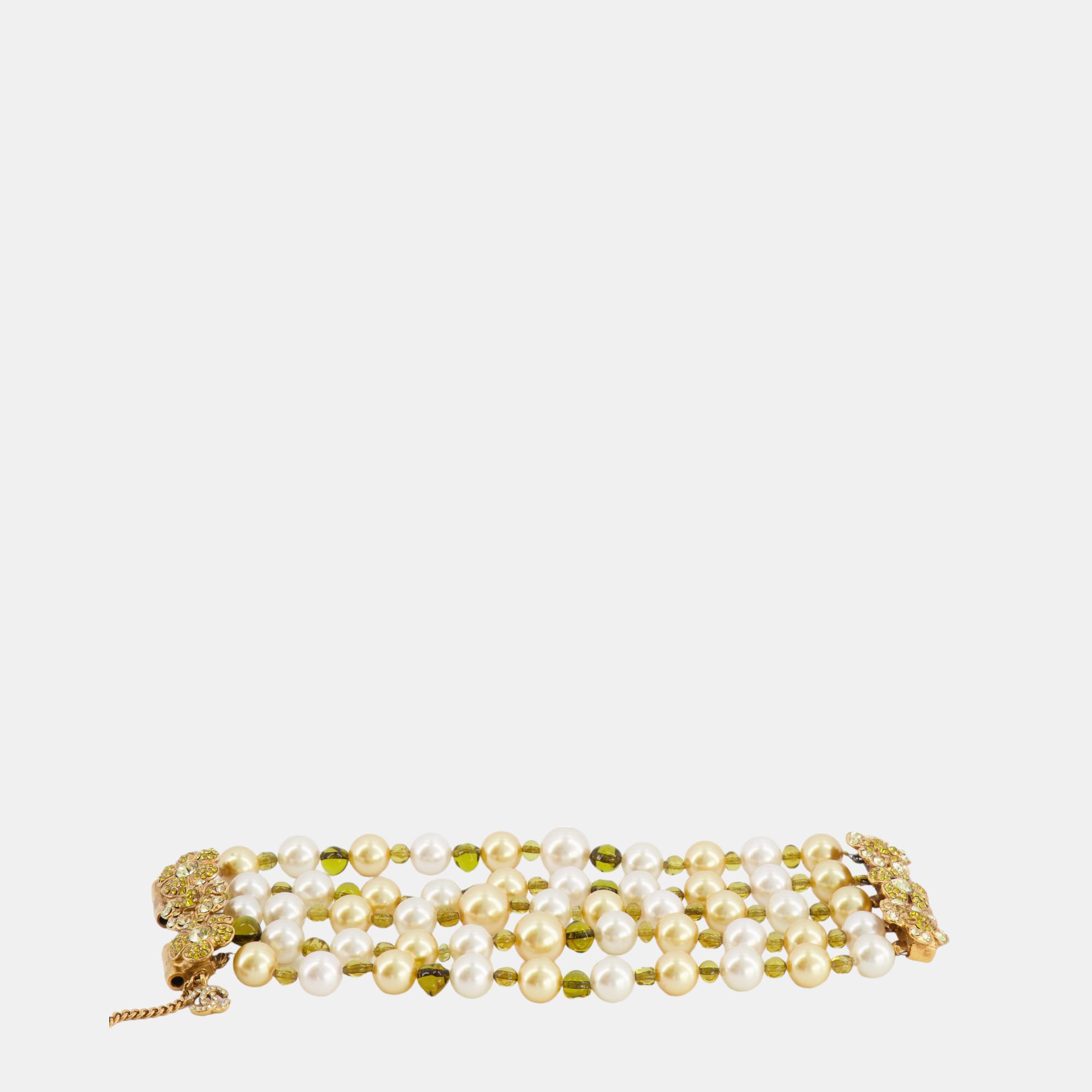 

Chanel White, Yellow and Green Pearls Bracelet with Flower Crystal Embellishment