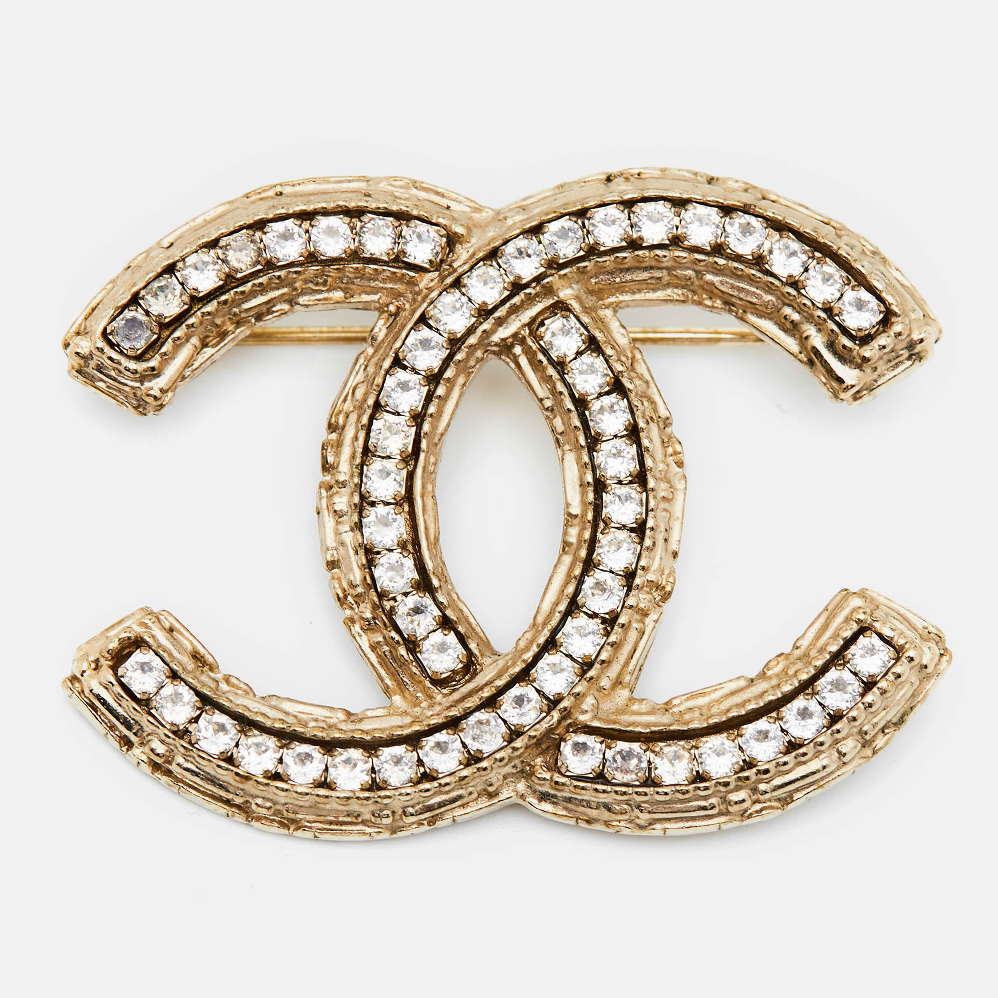 

Chanel Pale Gold Tone Crystal CC Brooch