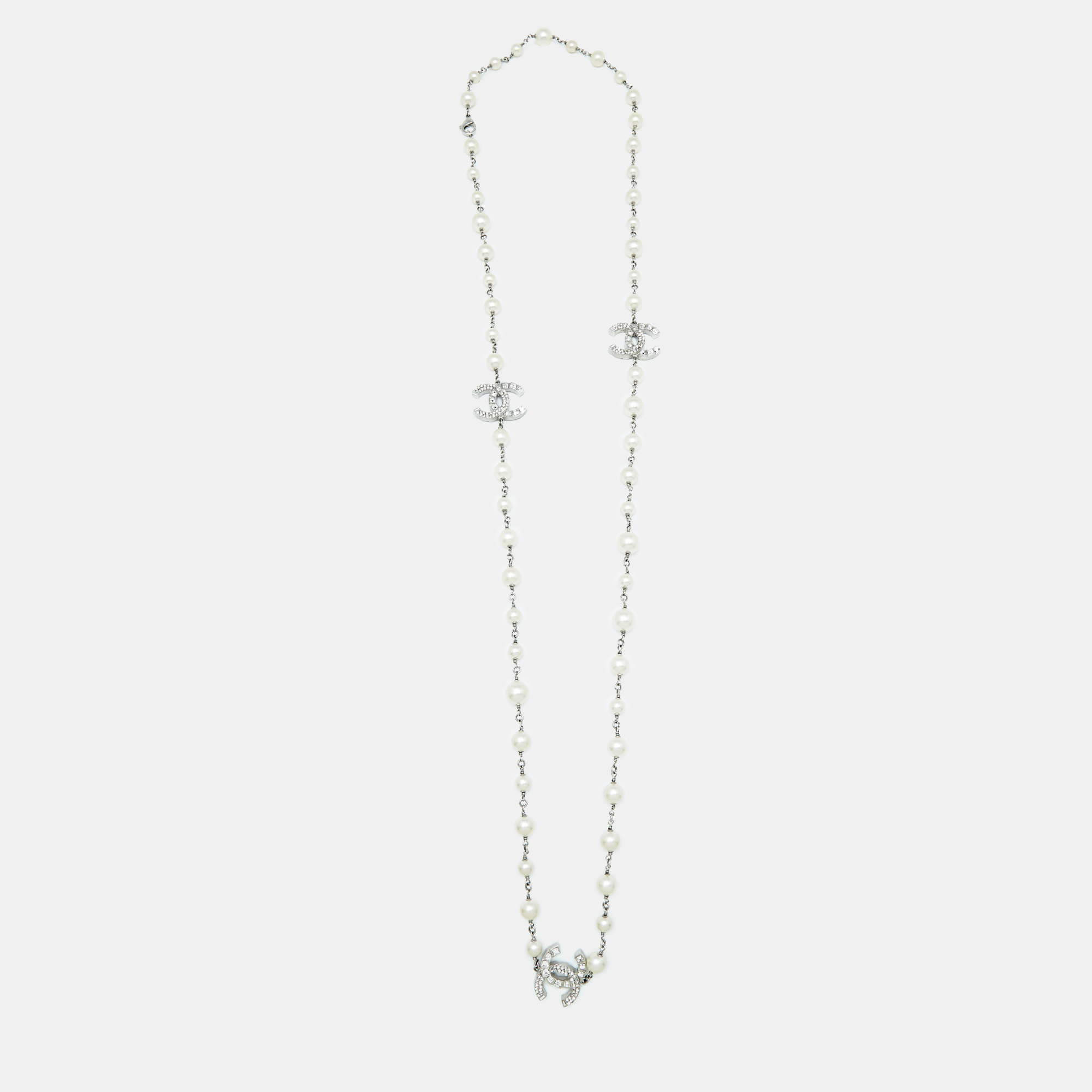 

Chanel Faux Pearl Crystal CC Logo Silver Tone Long Bead Necklace
