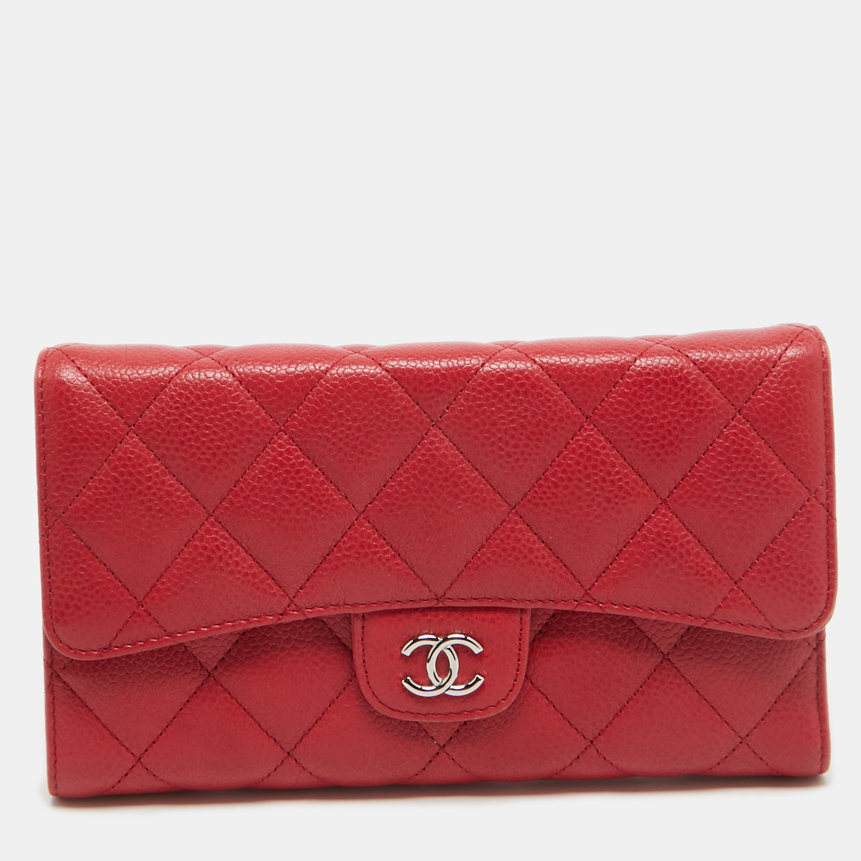 This Chanel wallet is conveniently designed for everyday use. Crafted from quilted Caviar leather the wallet opens to reveal slip compartments and multiple card slots for you to neatly arrange your cash and cards. This stylish piece is complete with the famous interlocking CC on the front flap.