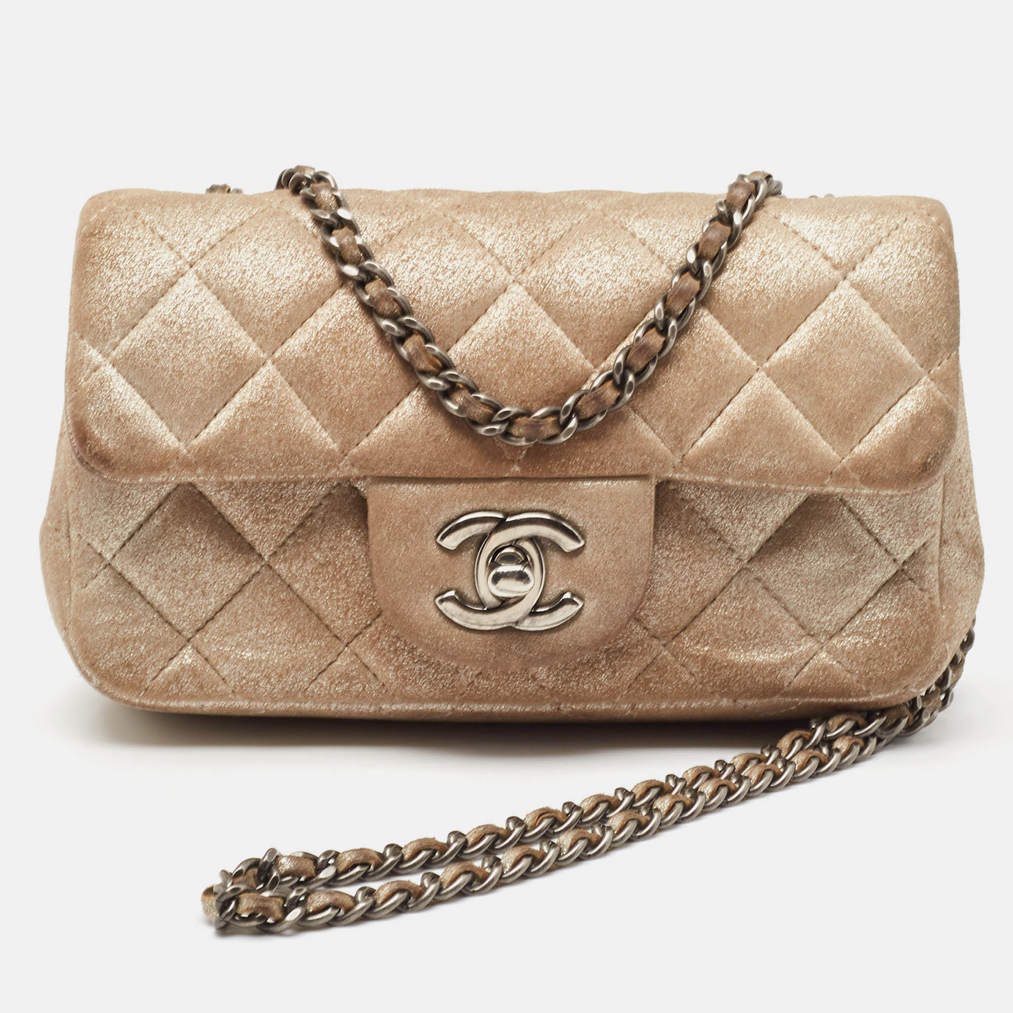 

Chanel Beige Quilted Shimmering Leather Extra Mini Classic Flap Bag