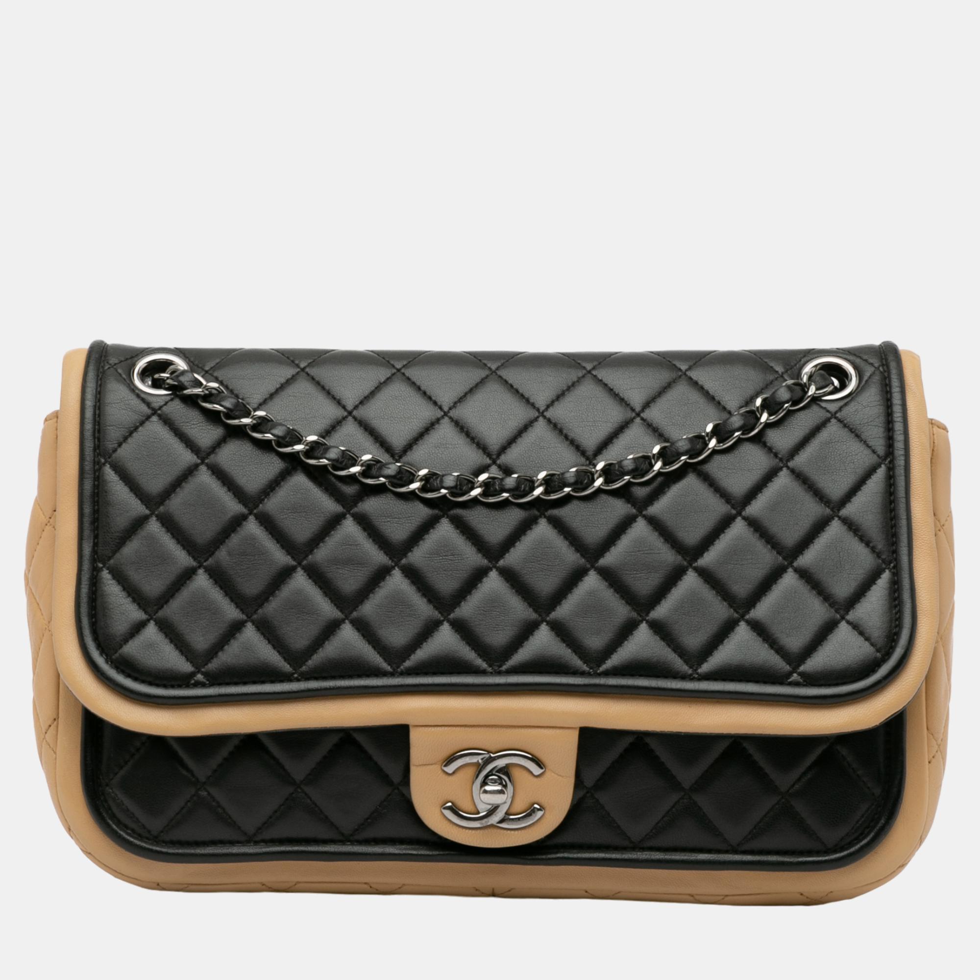 

Chanel Black Jumbo Classic Bicolor Lambskin Twist Flap