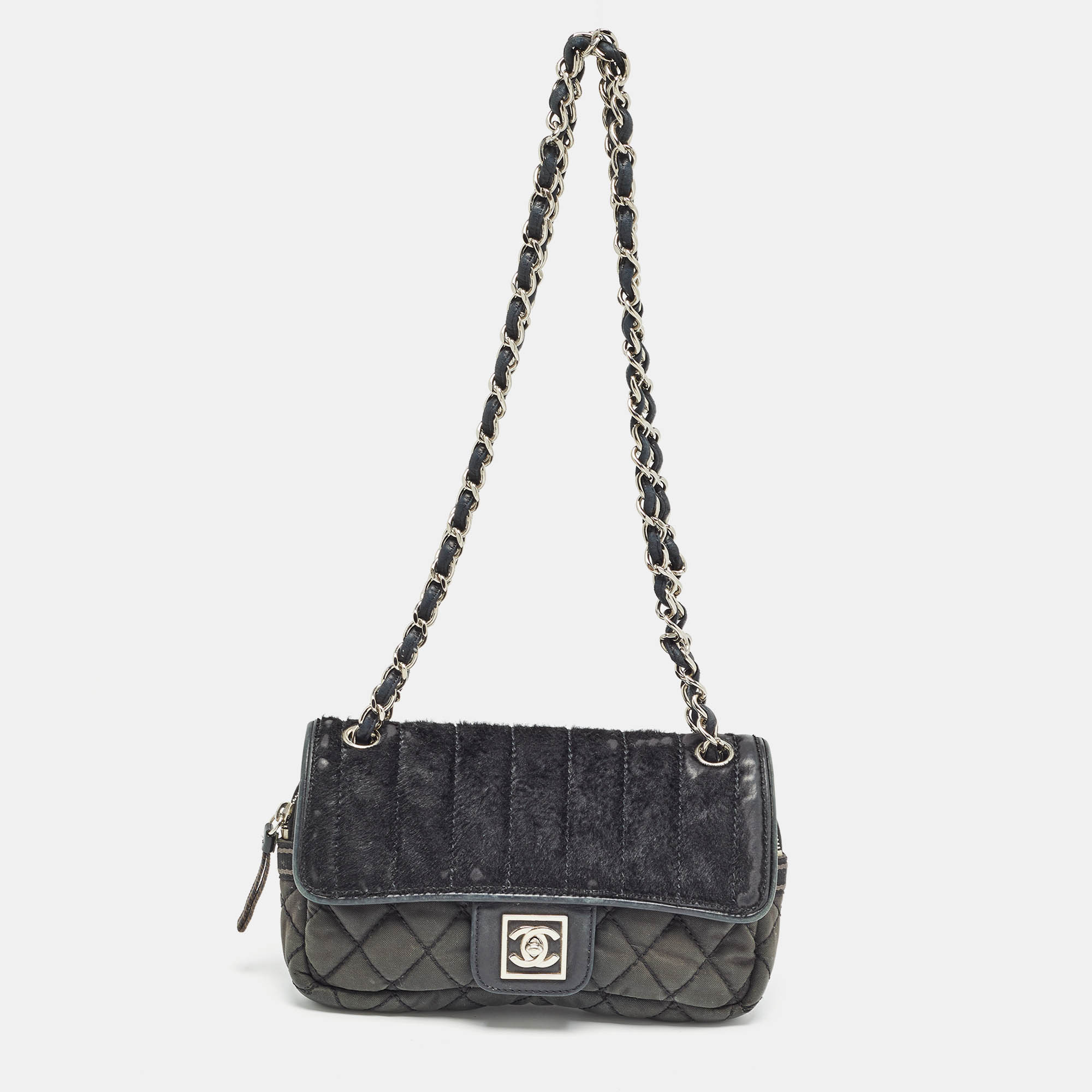 

Chanel Black Quilted Nylon and Leather Sport Line Camera Flap Bag