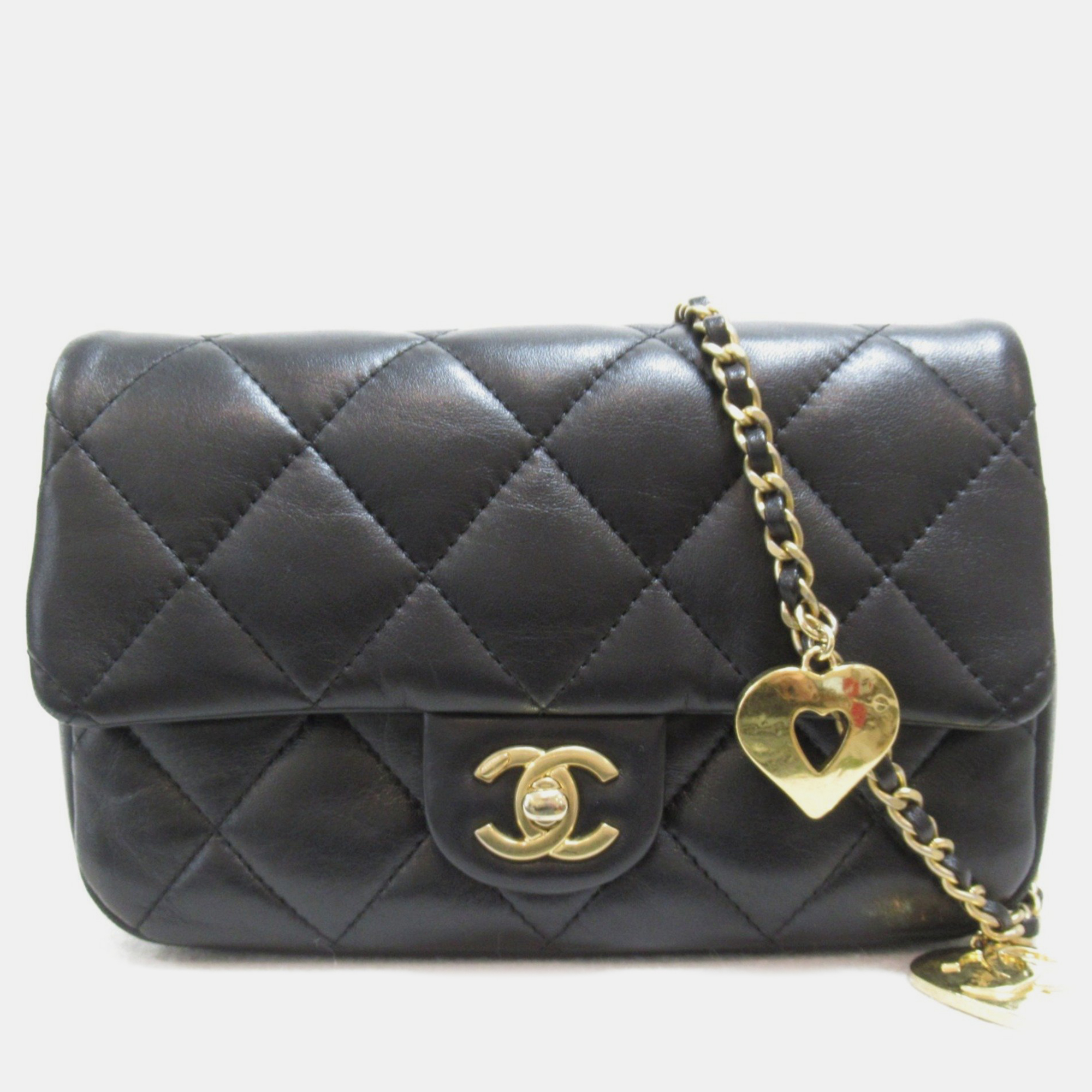

Chanel Black Quilted Lambskin Heart Chain Mini Flap Bag