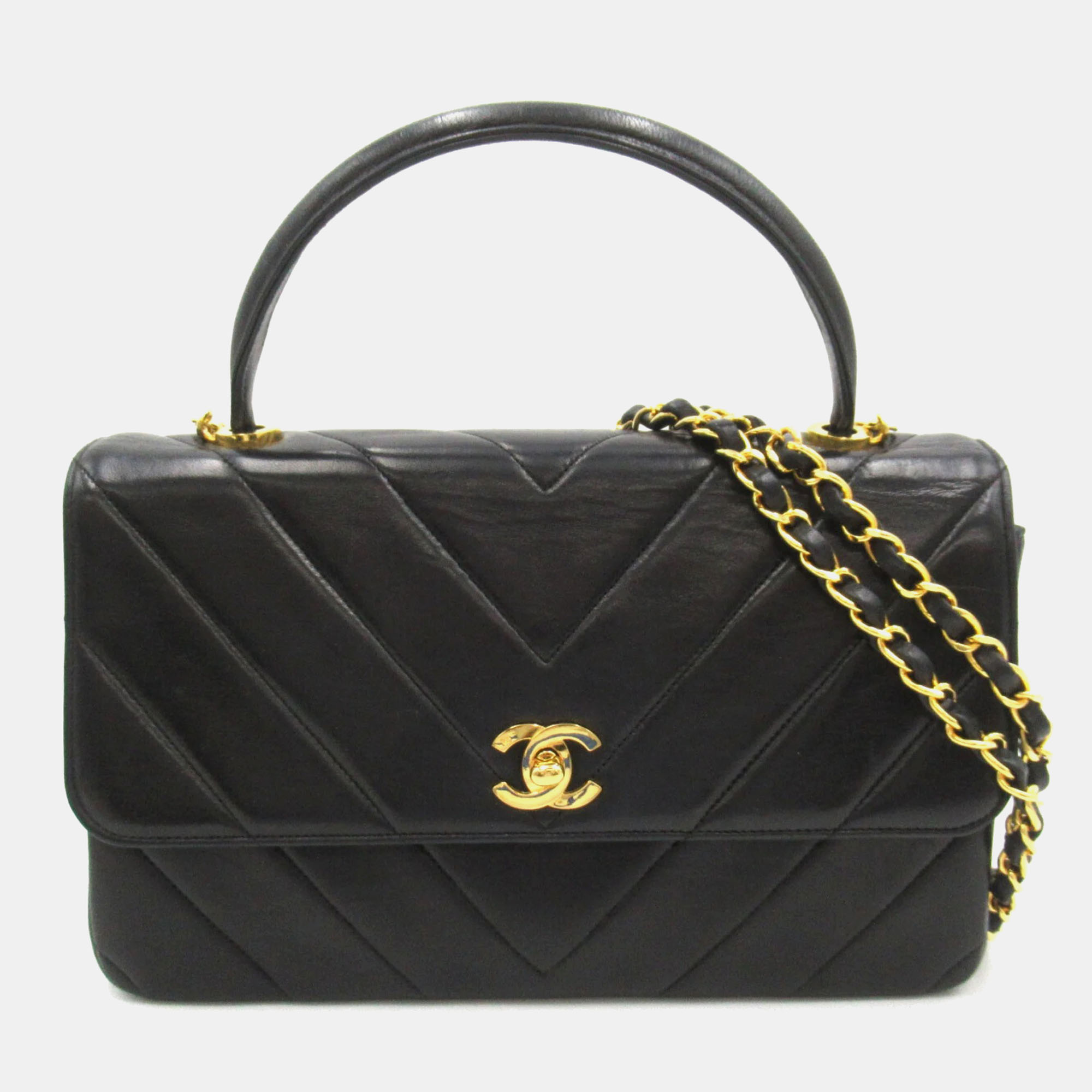 

Chanel Black Leather Chevron Top Handle Flap Bag
