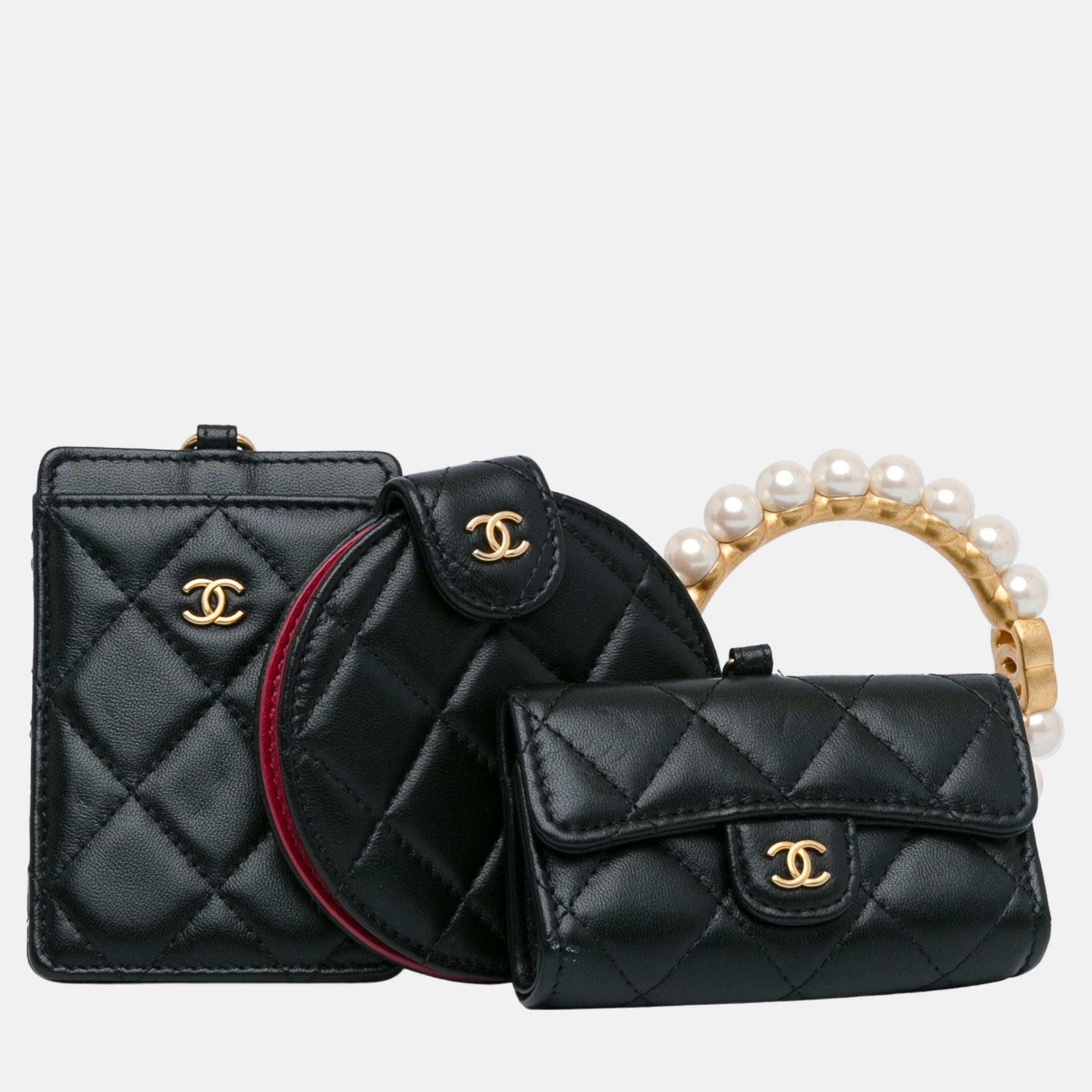 

Chanel Black Lambskin Pearl Crown CC Wristlet Multi Pouches