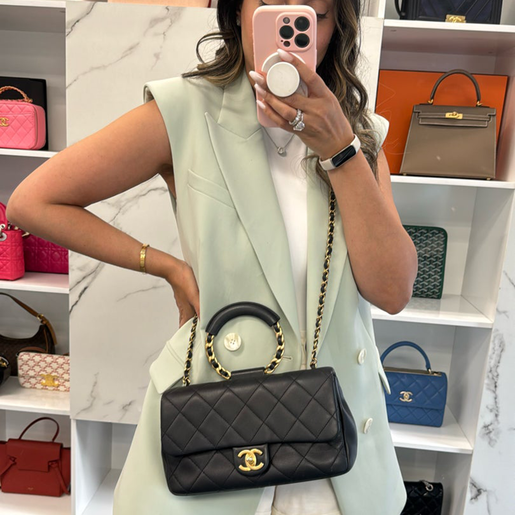 

Chanel Black Calfskin Wristlet Bag