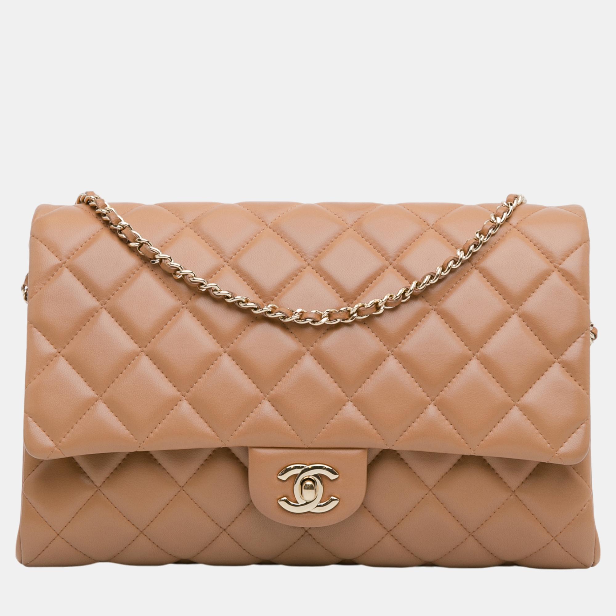 

Chanel Brown CC Quilted Lambskin Clutch With Chain