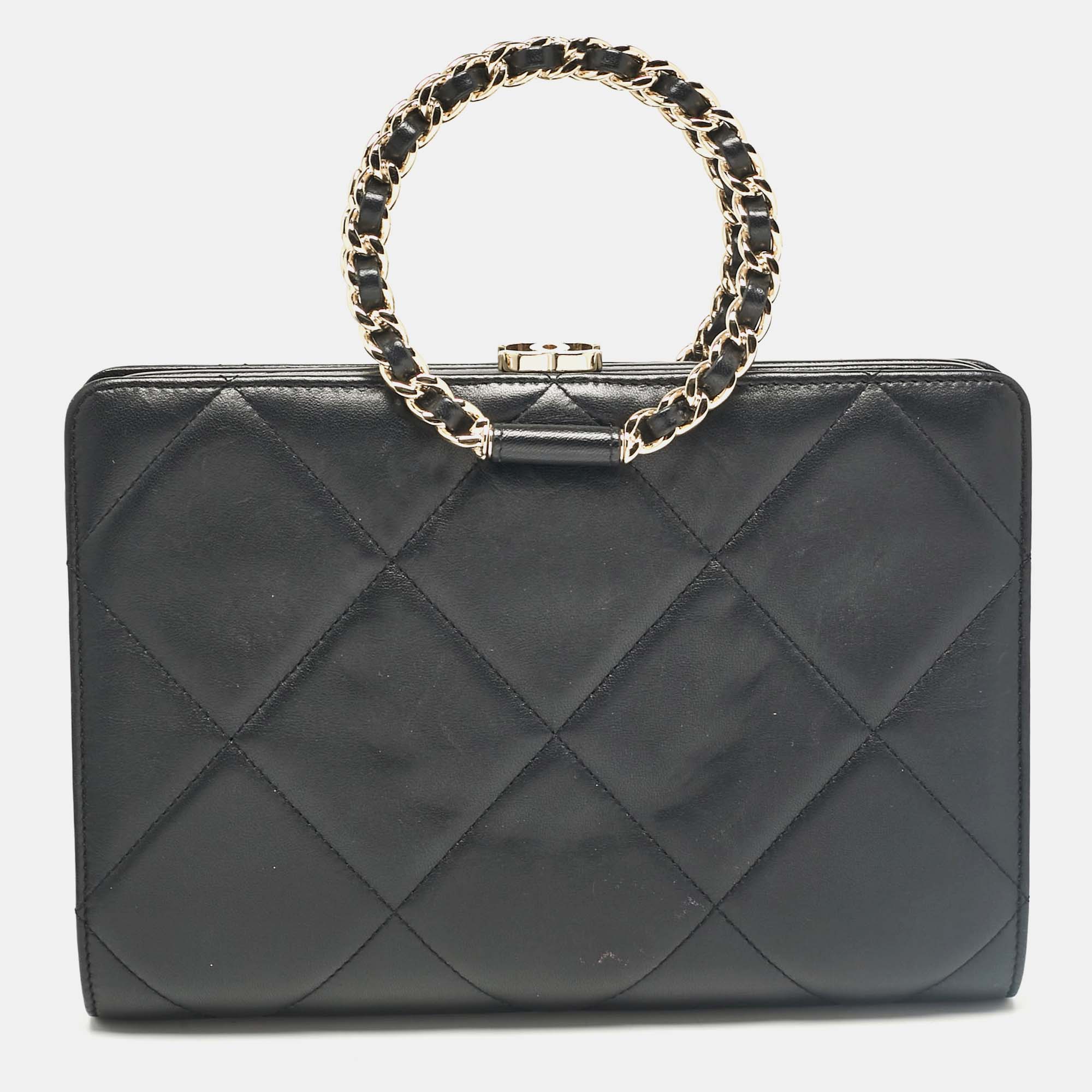 

Chanel Black Quilted Leather Frame Round Handle Clutch Bag