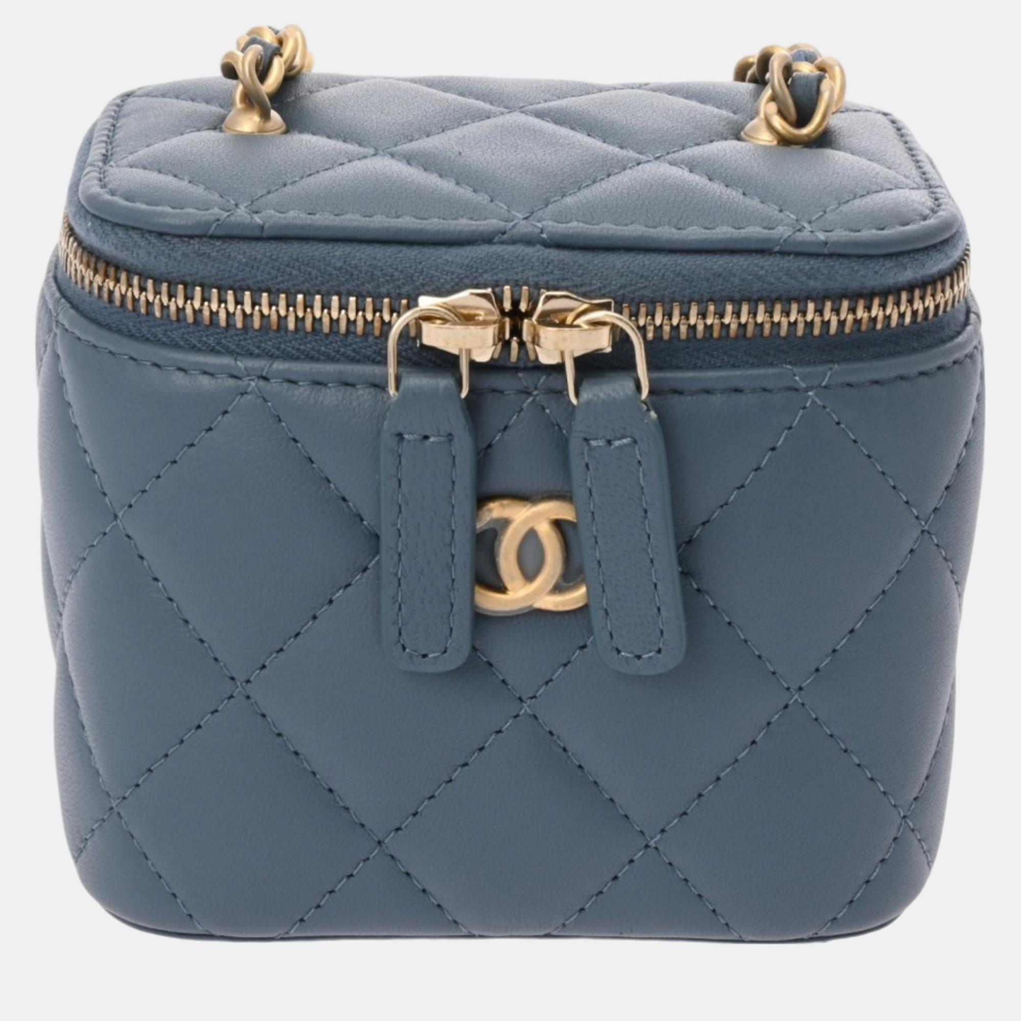 

Chanel Blue Navy Lambskin Matelasse Coco Ball Chain Pouch, Navy blue