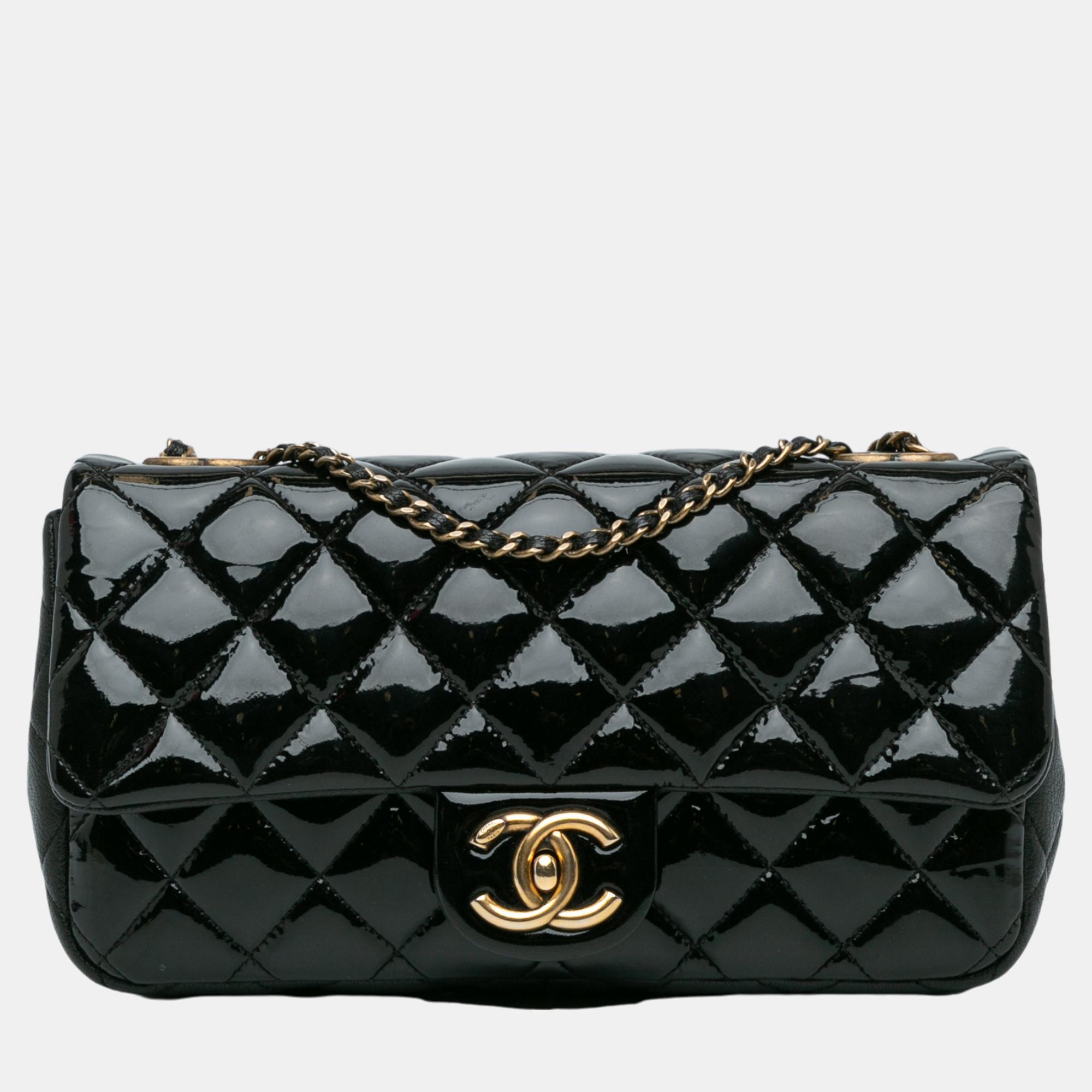 

Chanel Black Medium Patent Goatskin CC Eyelet Flap