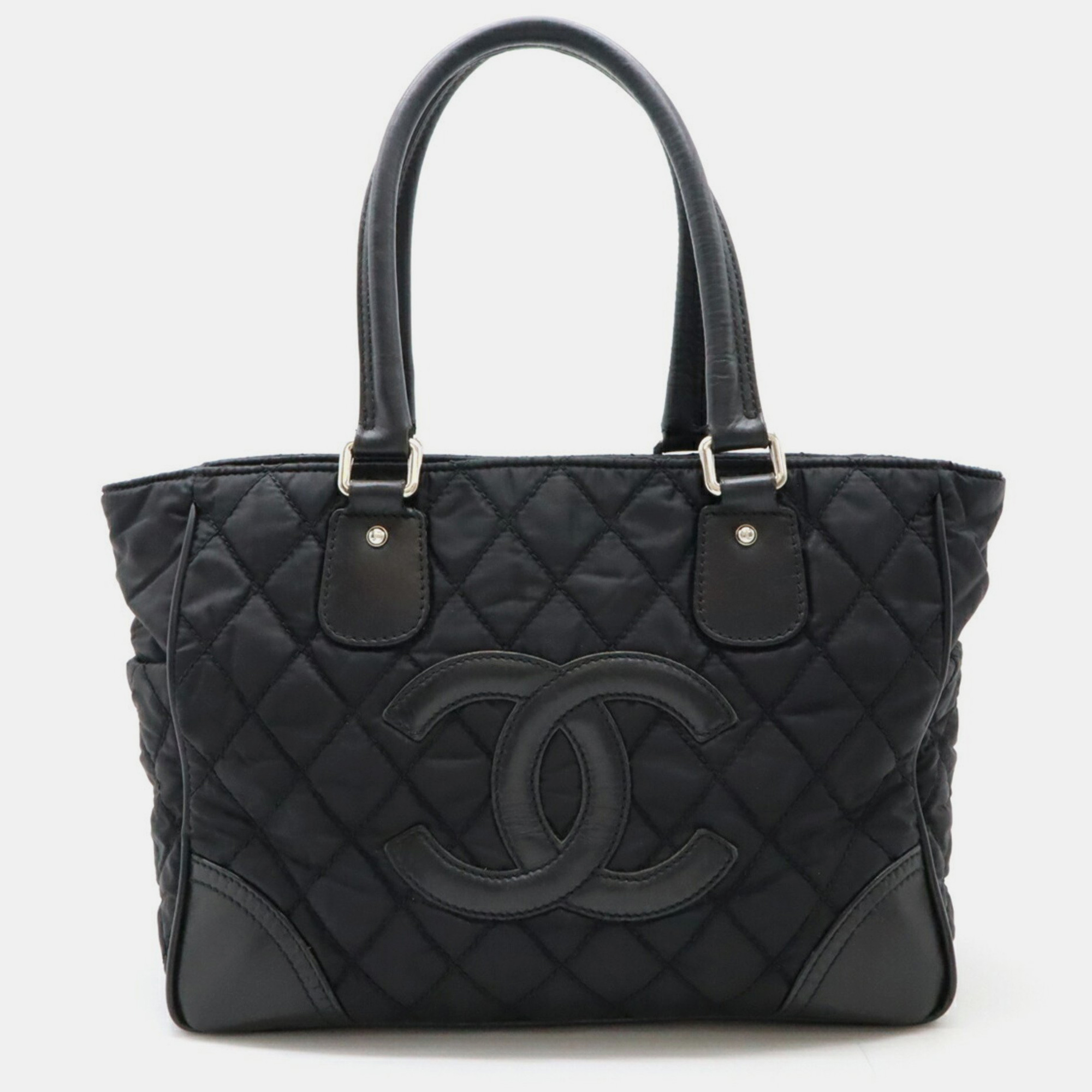 

Chanel Black Nylon Leather Paris New York Line Matelasse Coco Mark Tote Bag