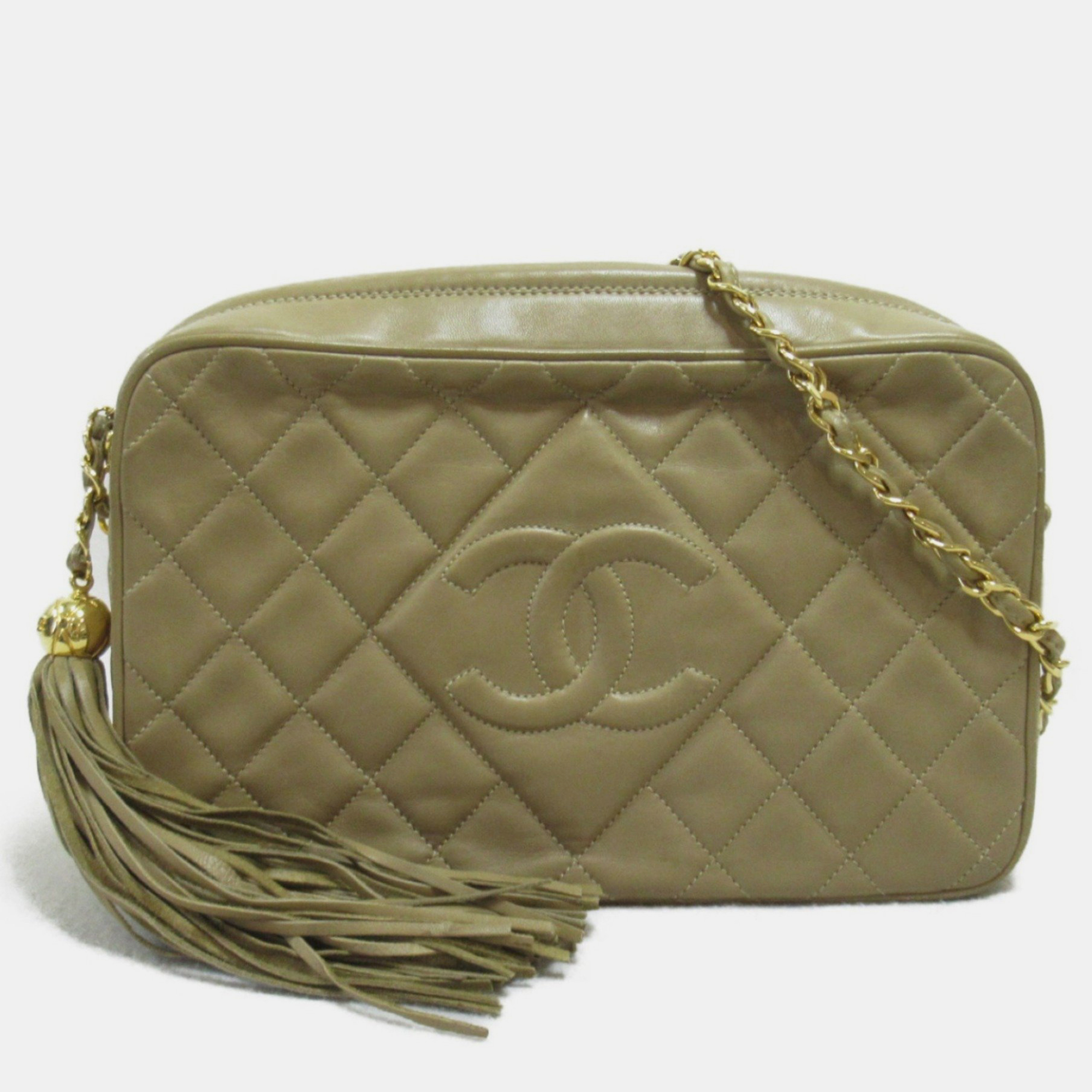 

Chanel Lambskin (sheepskin) Beige Tassel Bag