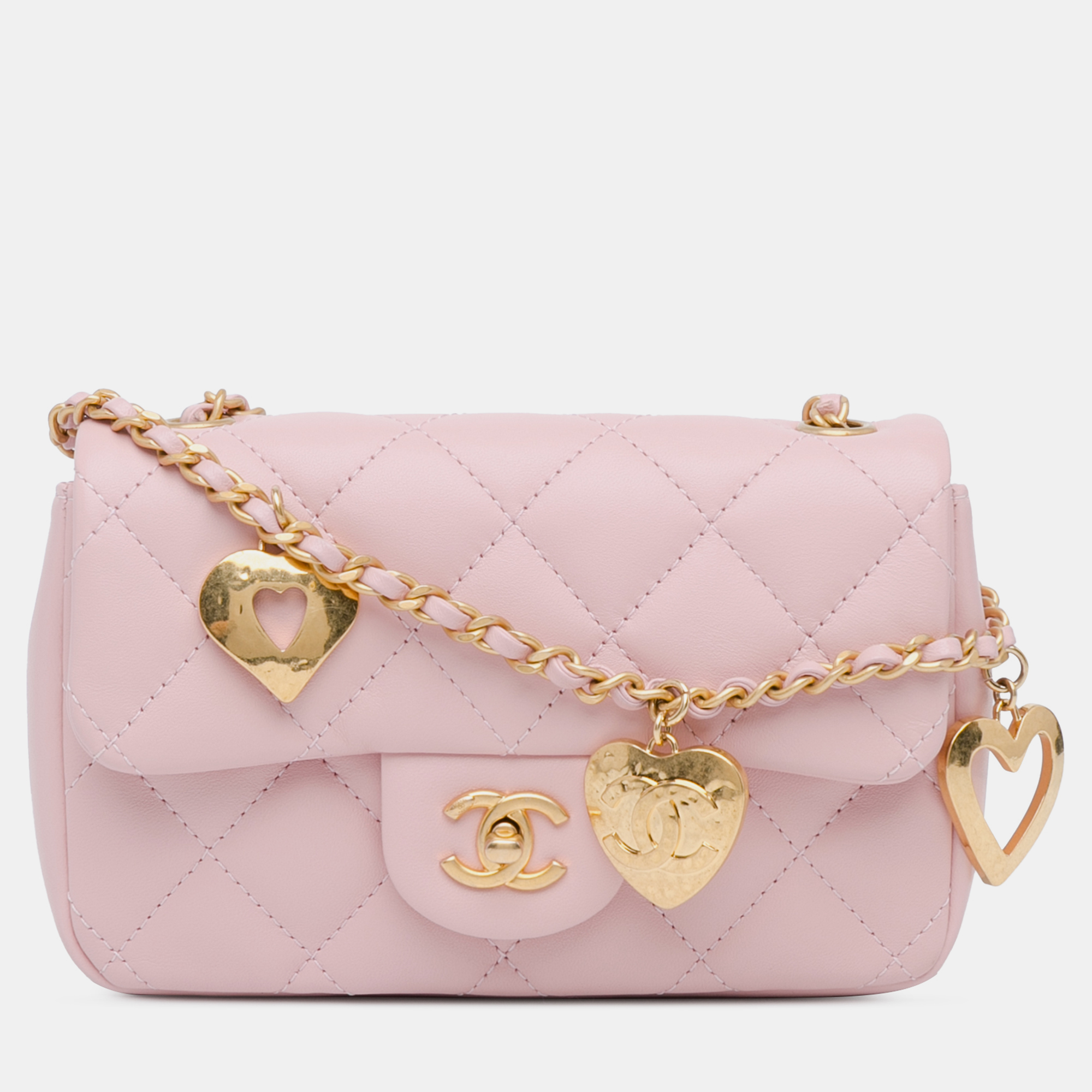 

Chanel Pink Lambskin Leather Mini Quilted Heart Charms Flap Bag