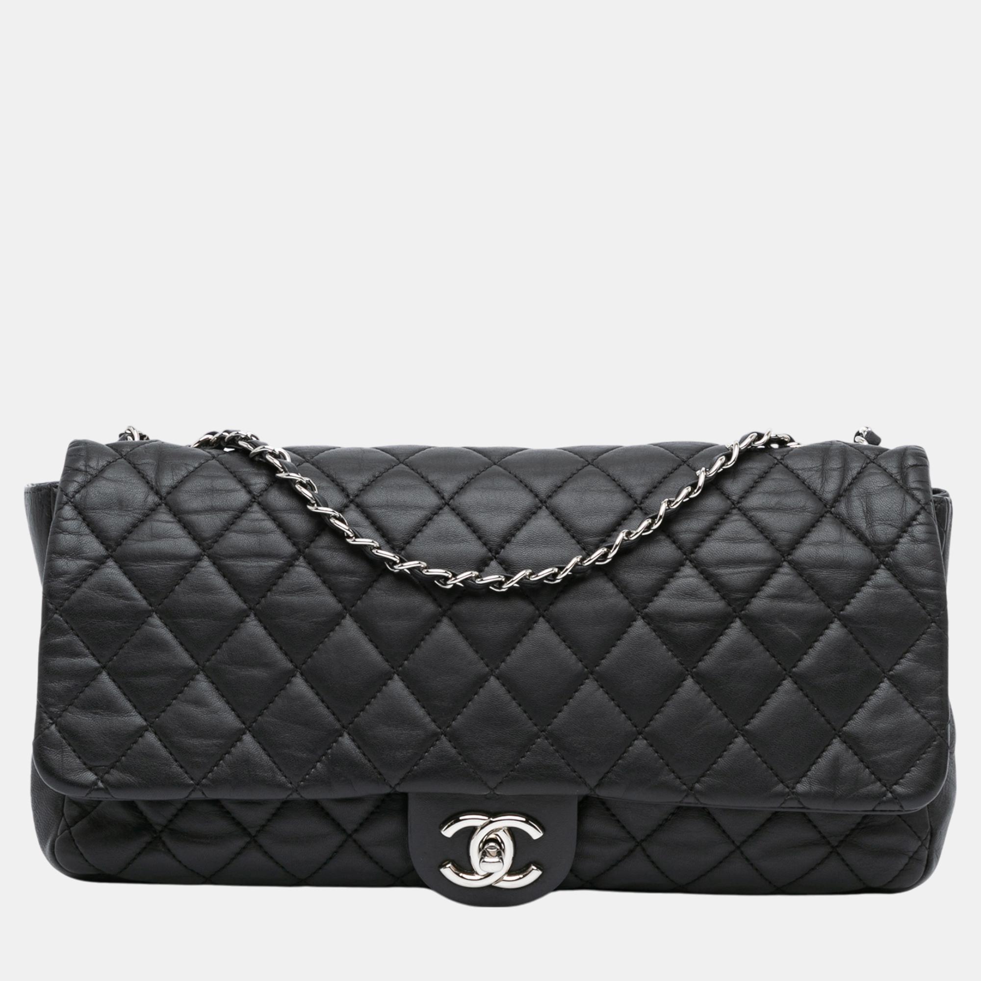 

Chanel Black Jumbo Quilted Lambskin Coco Rain Flap