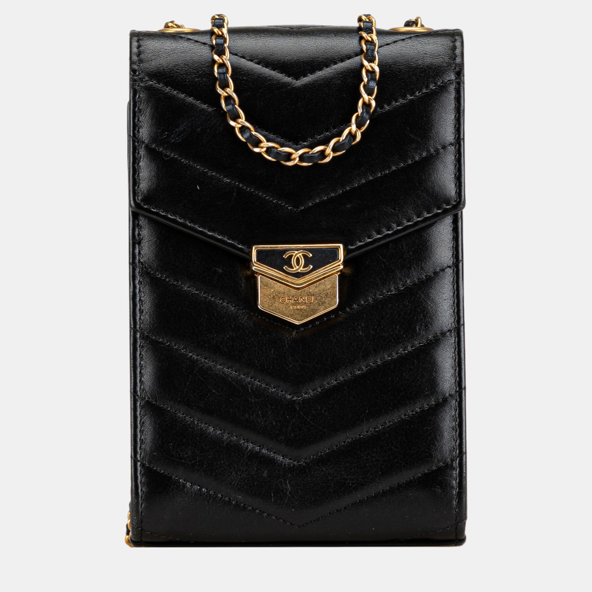 

Chanel Black Calfskin CC Chevron Medal Envelope Vertical Clutch With Chain