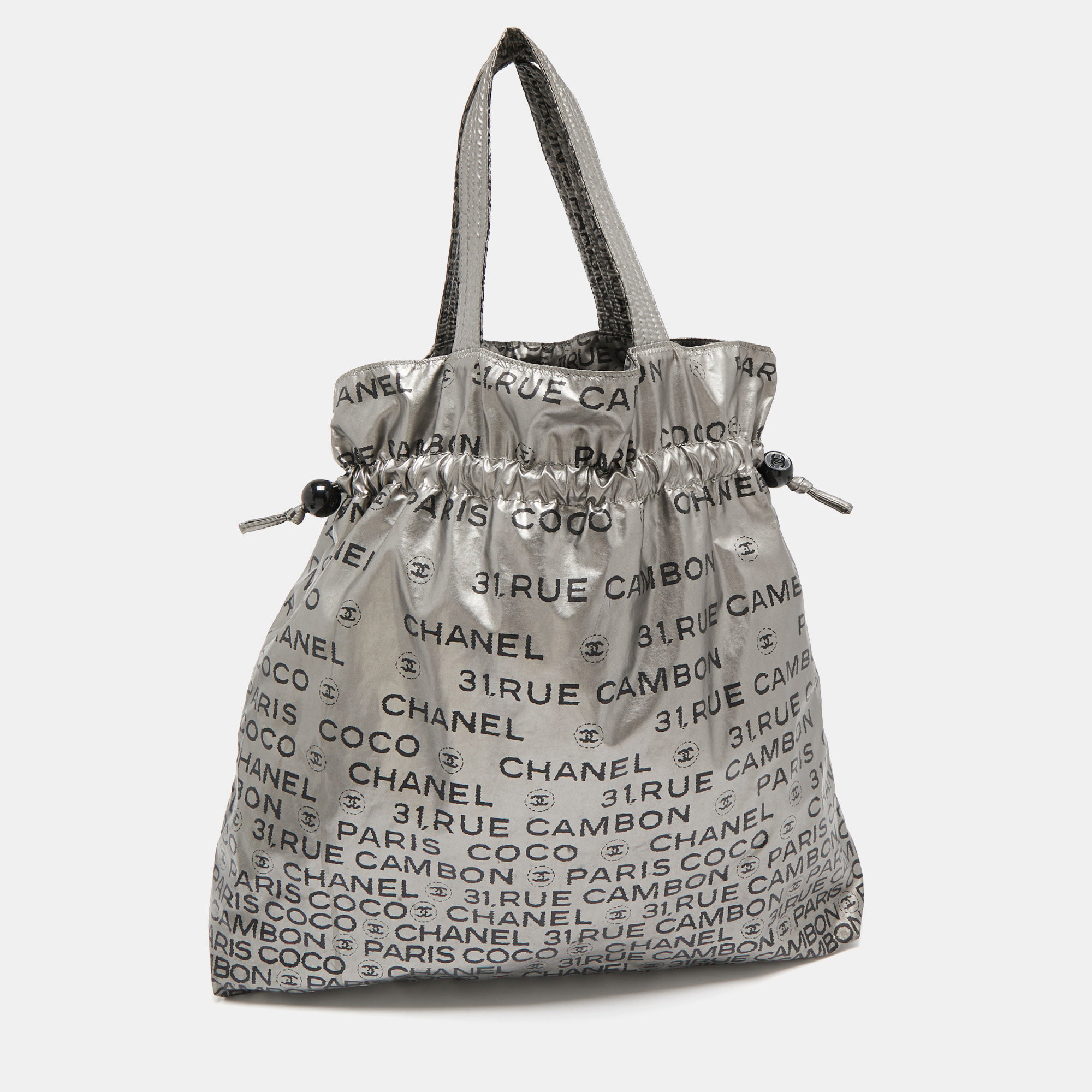 

Chanel Silver Coated Nylon 31 Rue Cambon Graphic Drawstring Tote