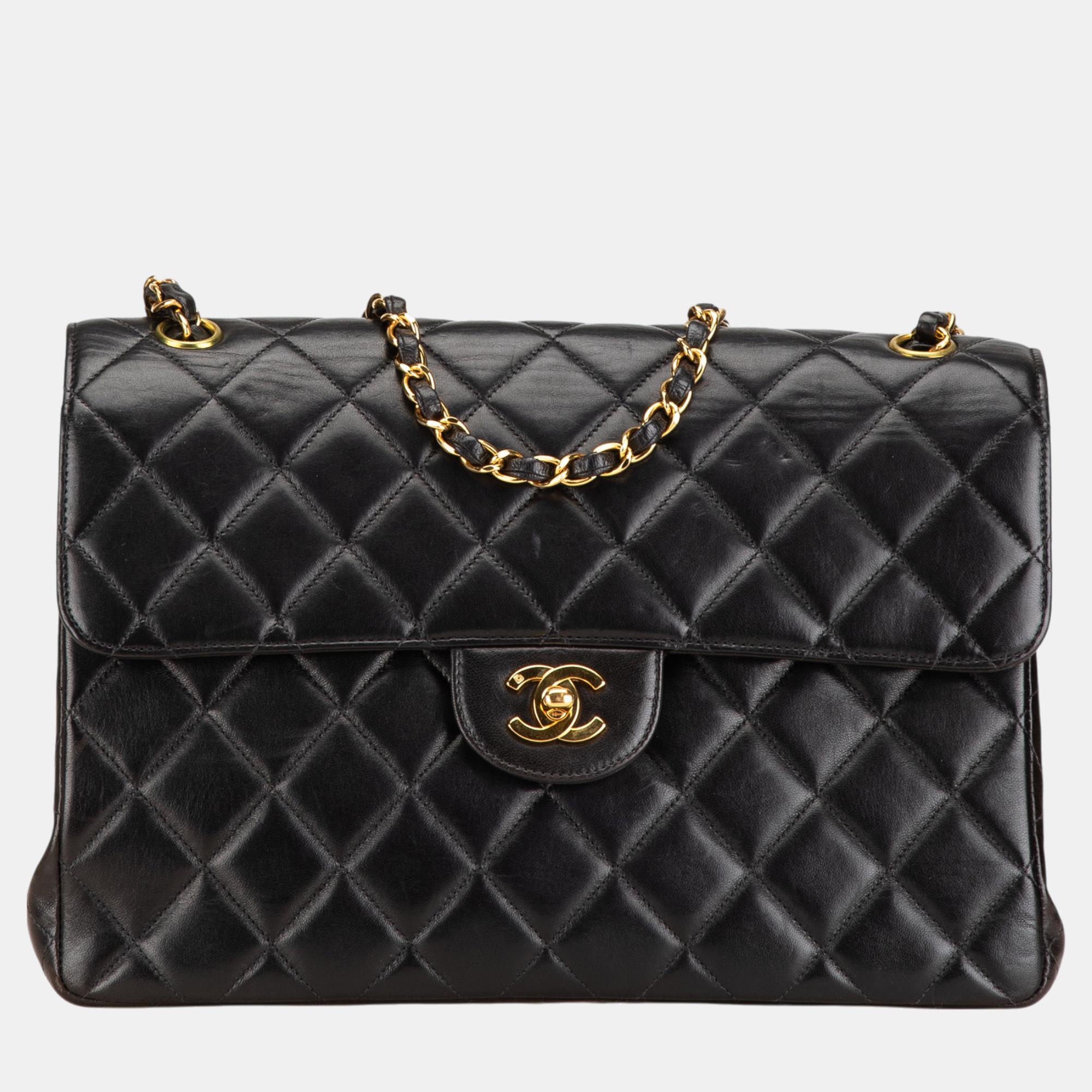 

Chanel Black Jumbo Lambskin Double Sided Flap