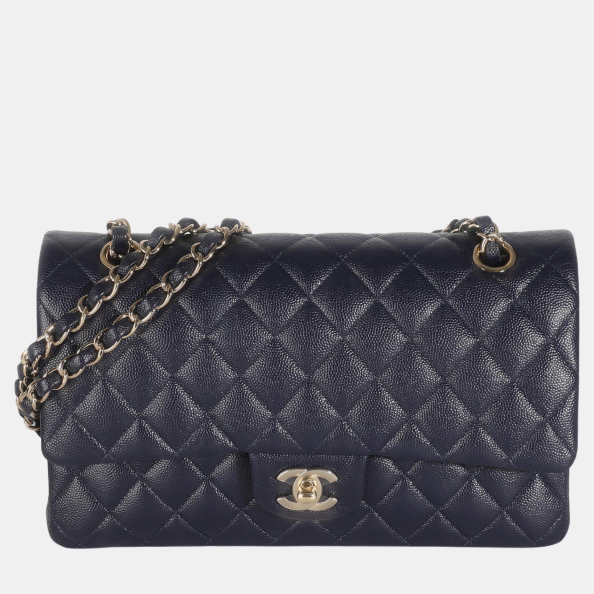 

Chanel Navy Quilted Caviar Medium Classic Double Flap Bag, Navy blue