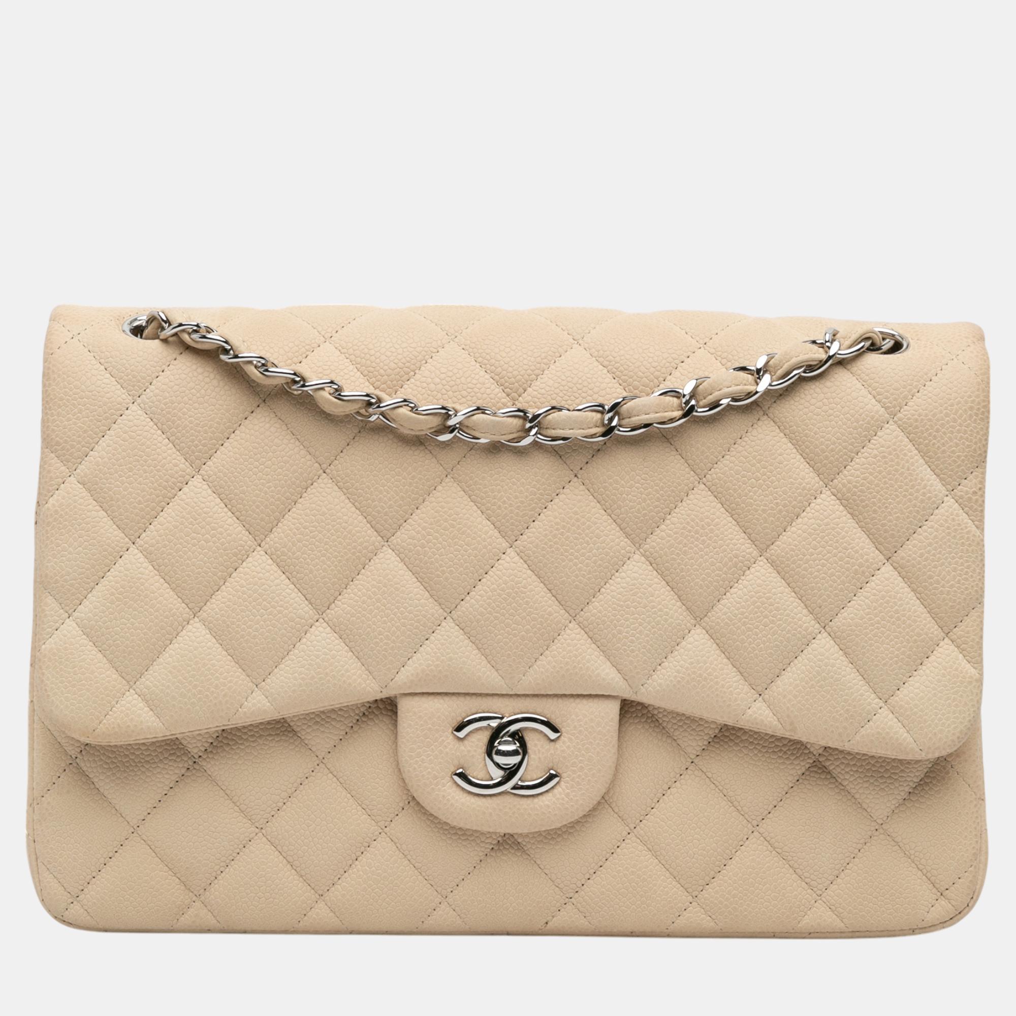 

Chanel Beige Jumbo Classic Caviar Double Flap