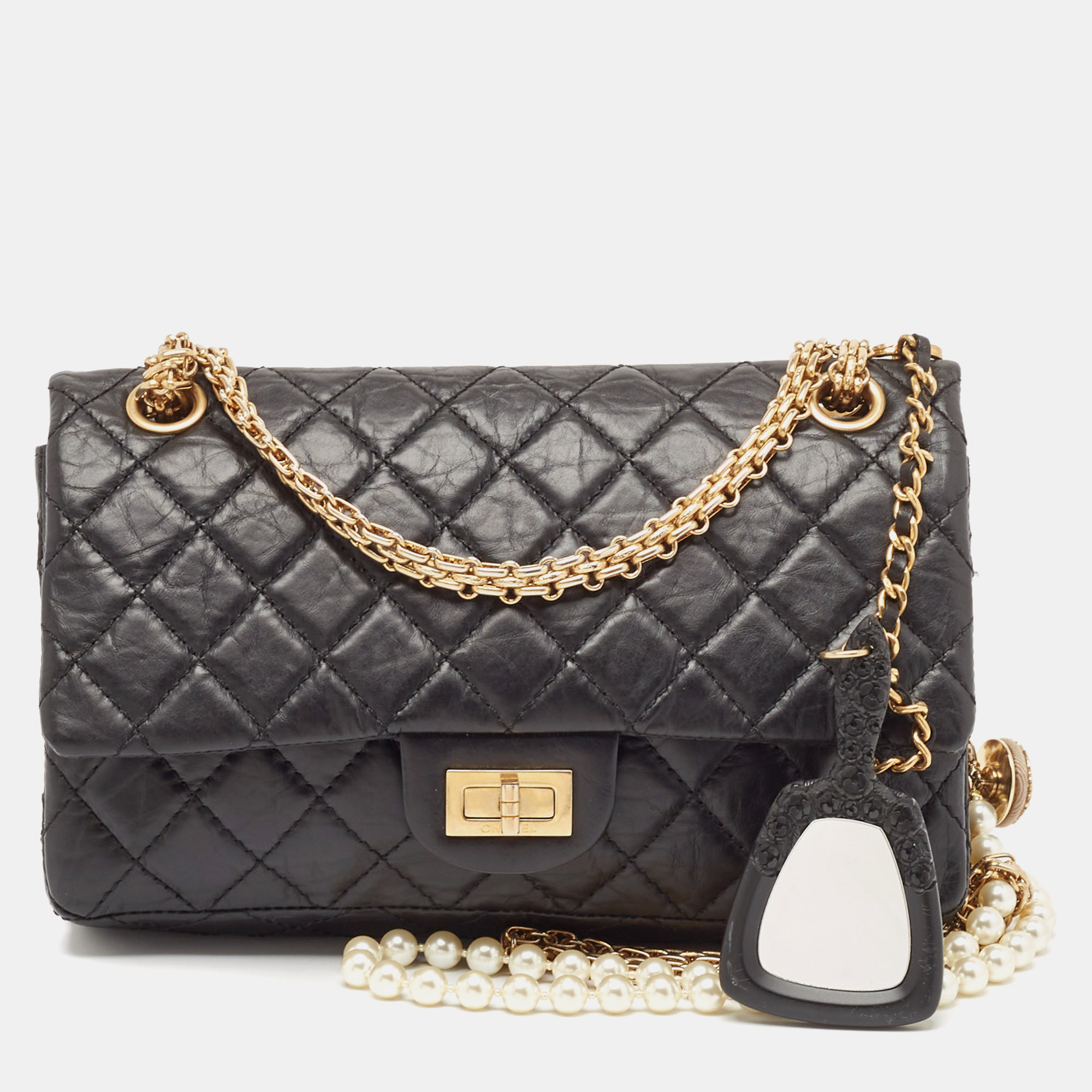 

Chanel Black Quilted Aged Leather Reissue 2.55 Pearl Embellished Classic 225 Flap Bag