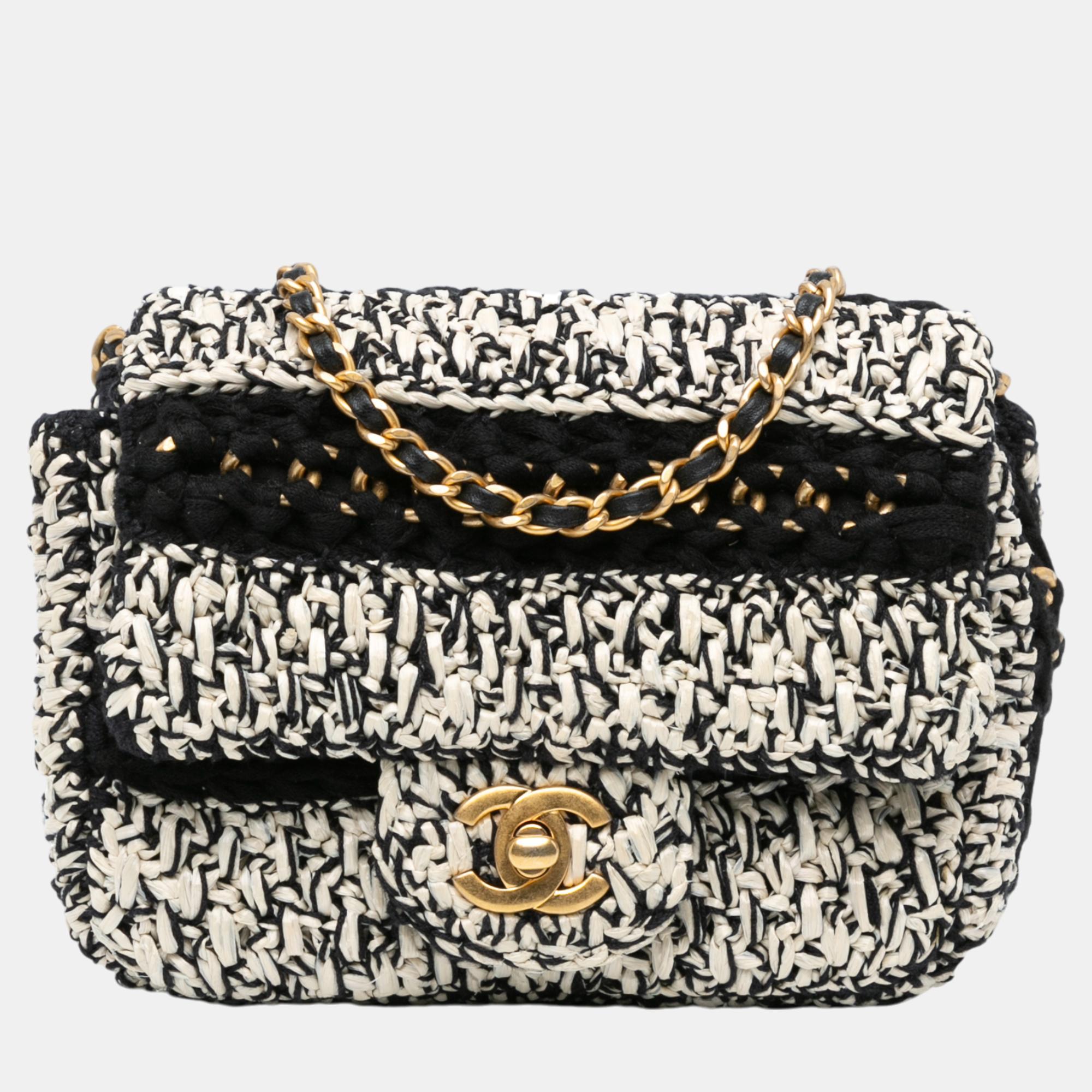 

Chanel Black/White Chanel Black/White Raffia Braided with Love Flap