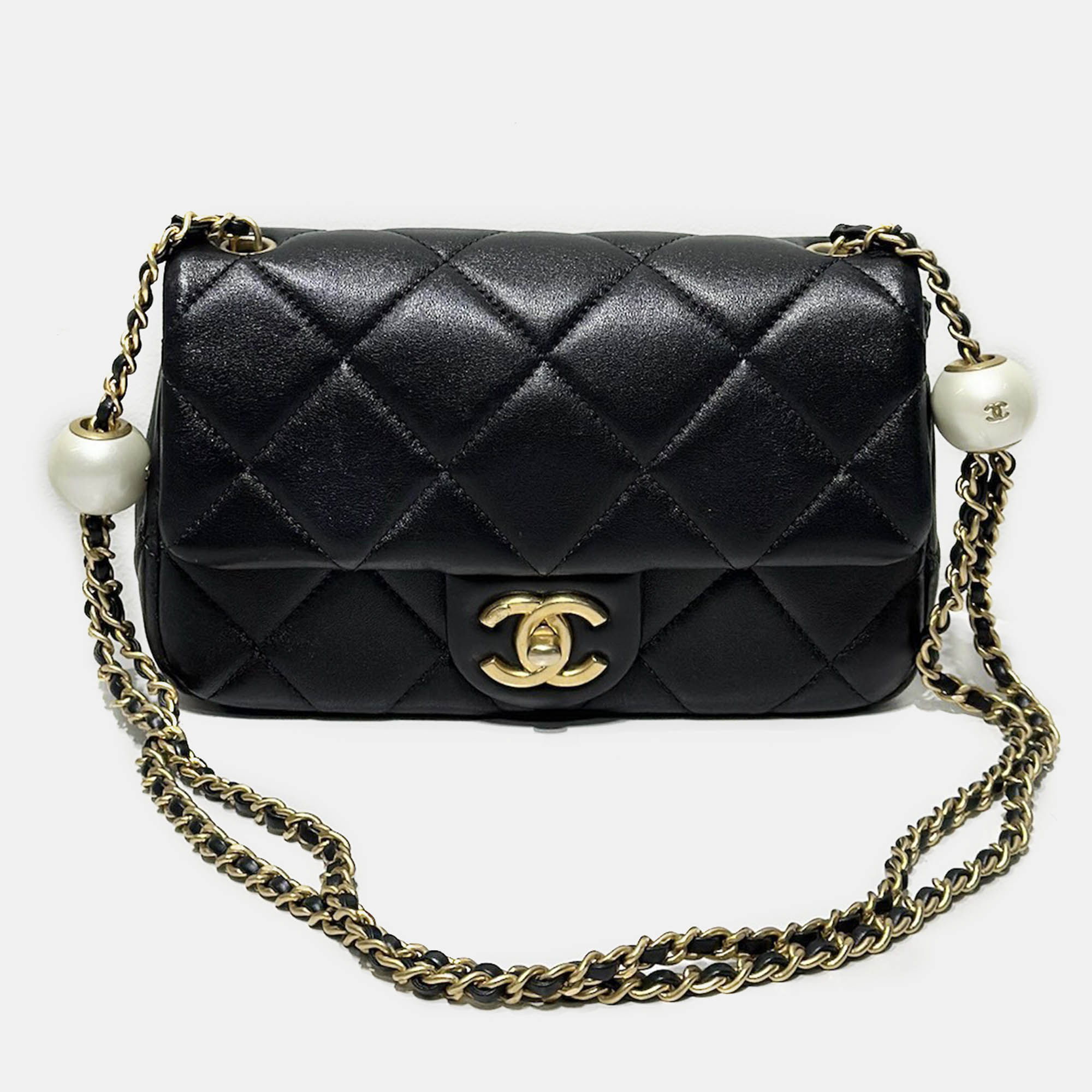 

Chanel Black Leather Quilted Pearl Small Flap Bag