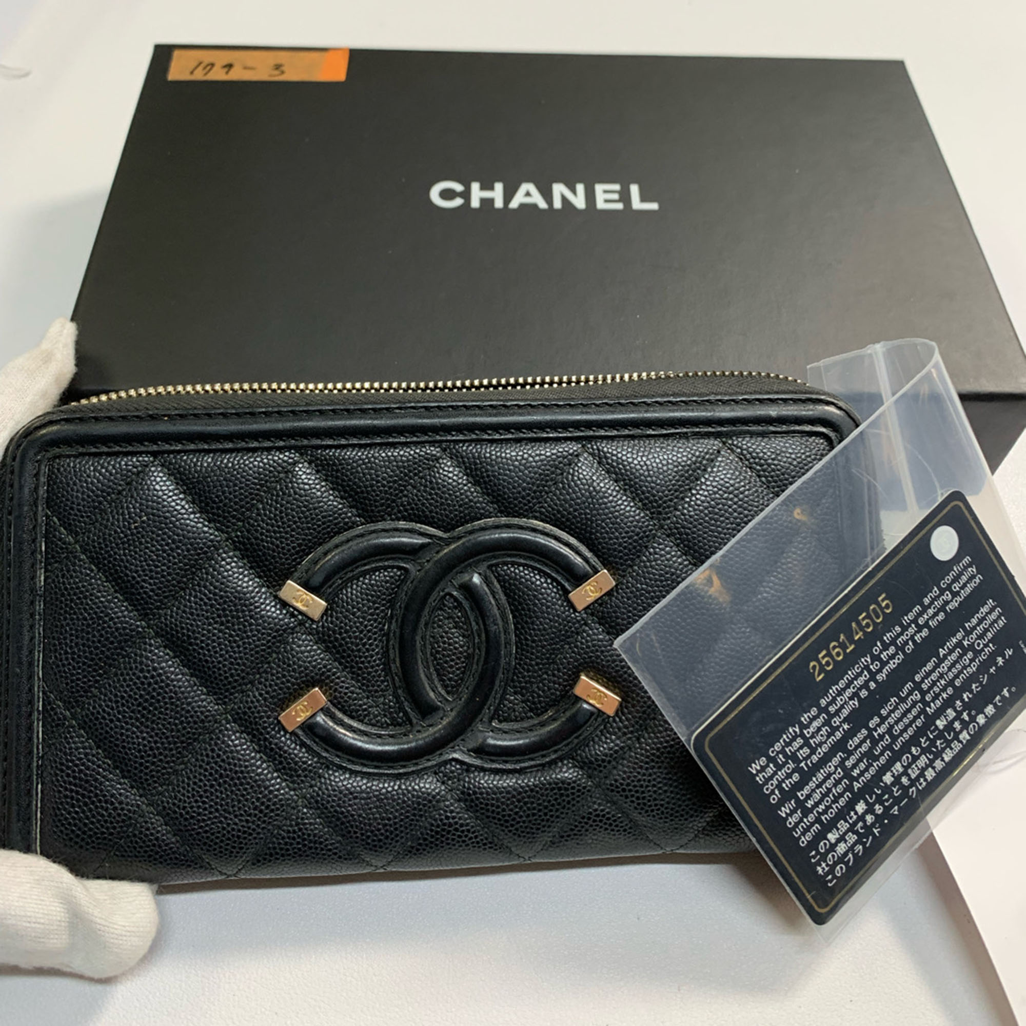 

Chanel Black Leather Caviar CC Filigree Zippy Wallet