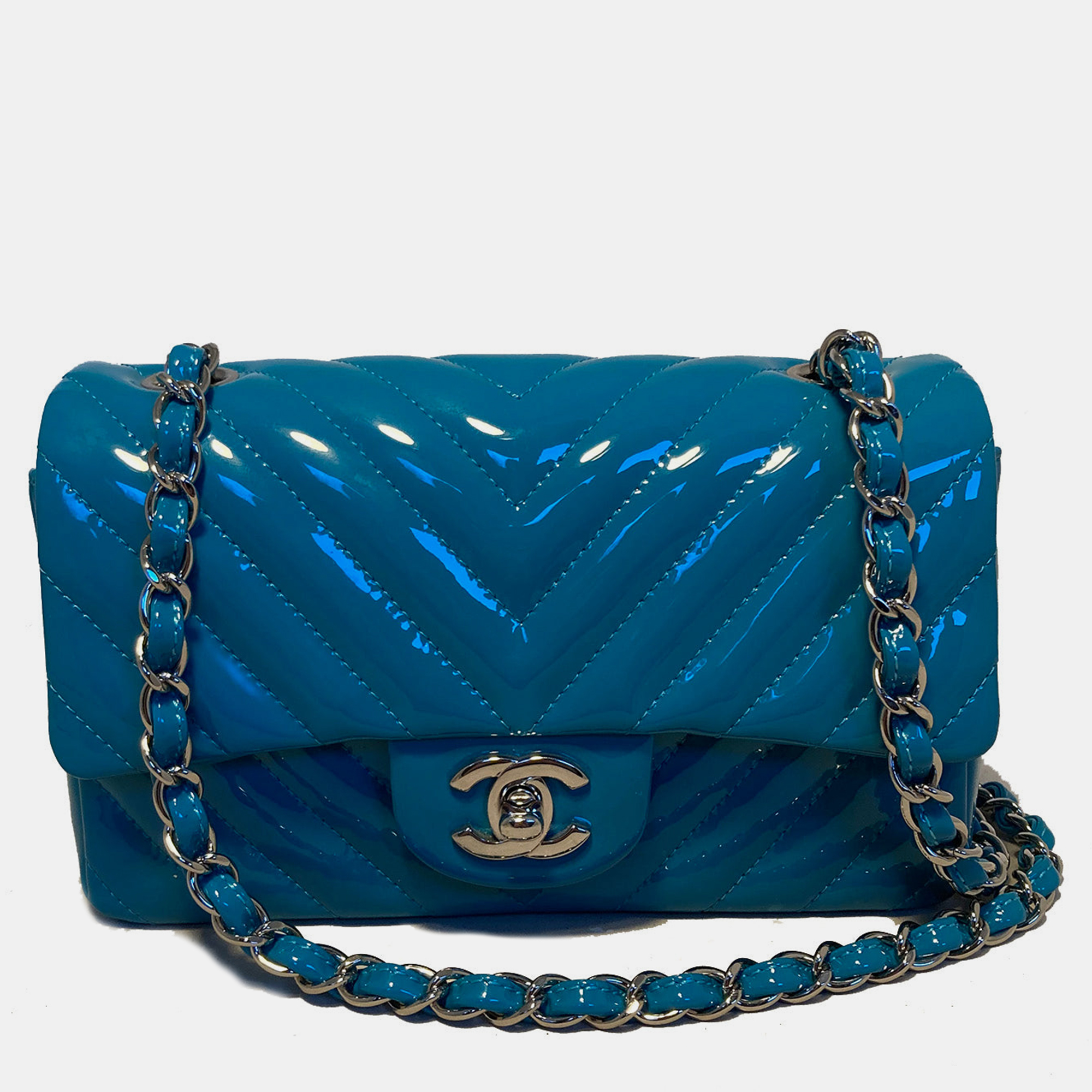 

Chanel Teal Chevron Quilted Patent Leather Mini Classic Flap, Blue