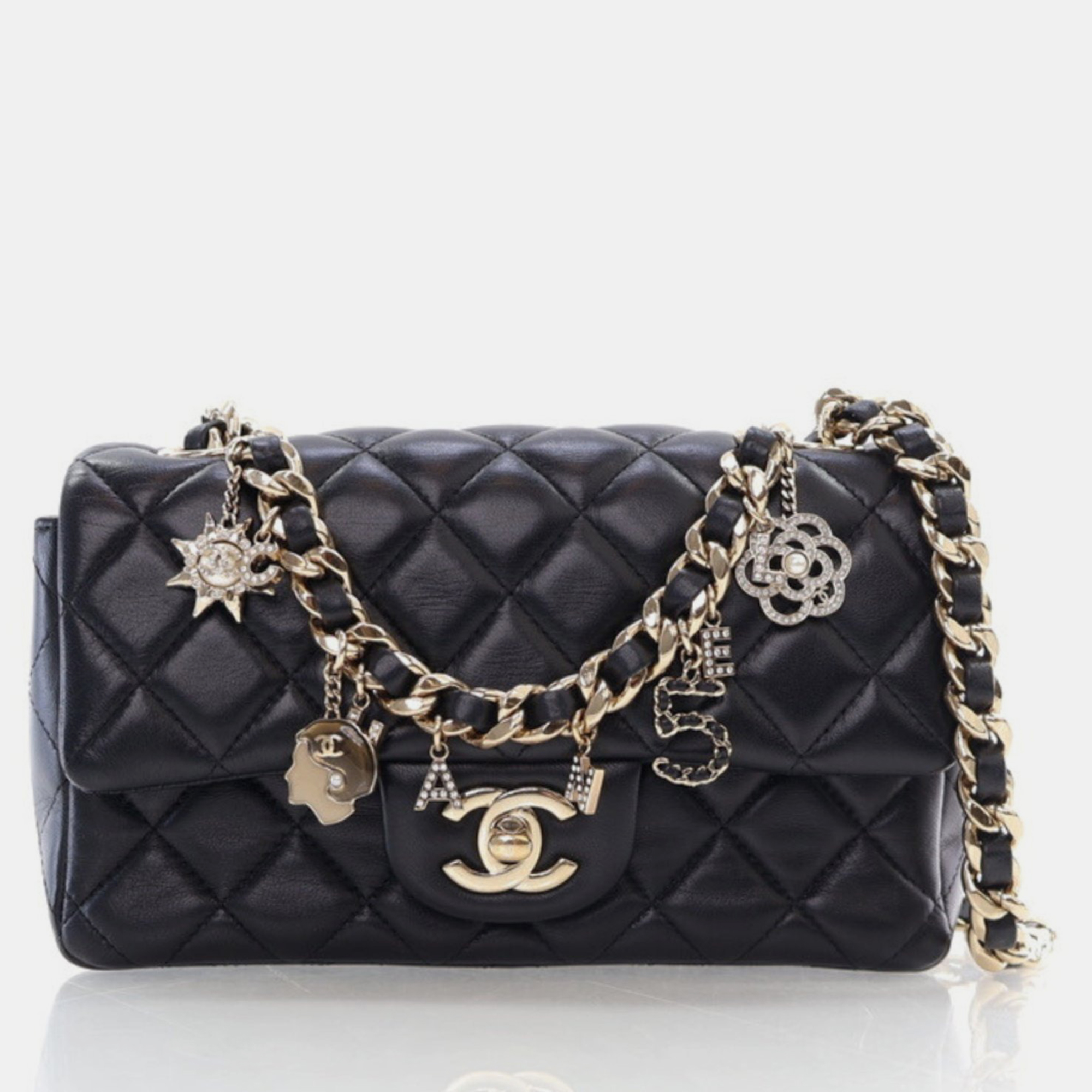 

Chanel Mini Black Lambskin Coco Charms Rectangle Flap Bag