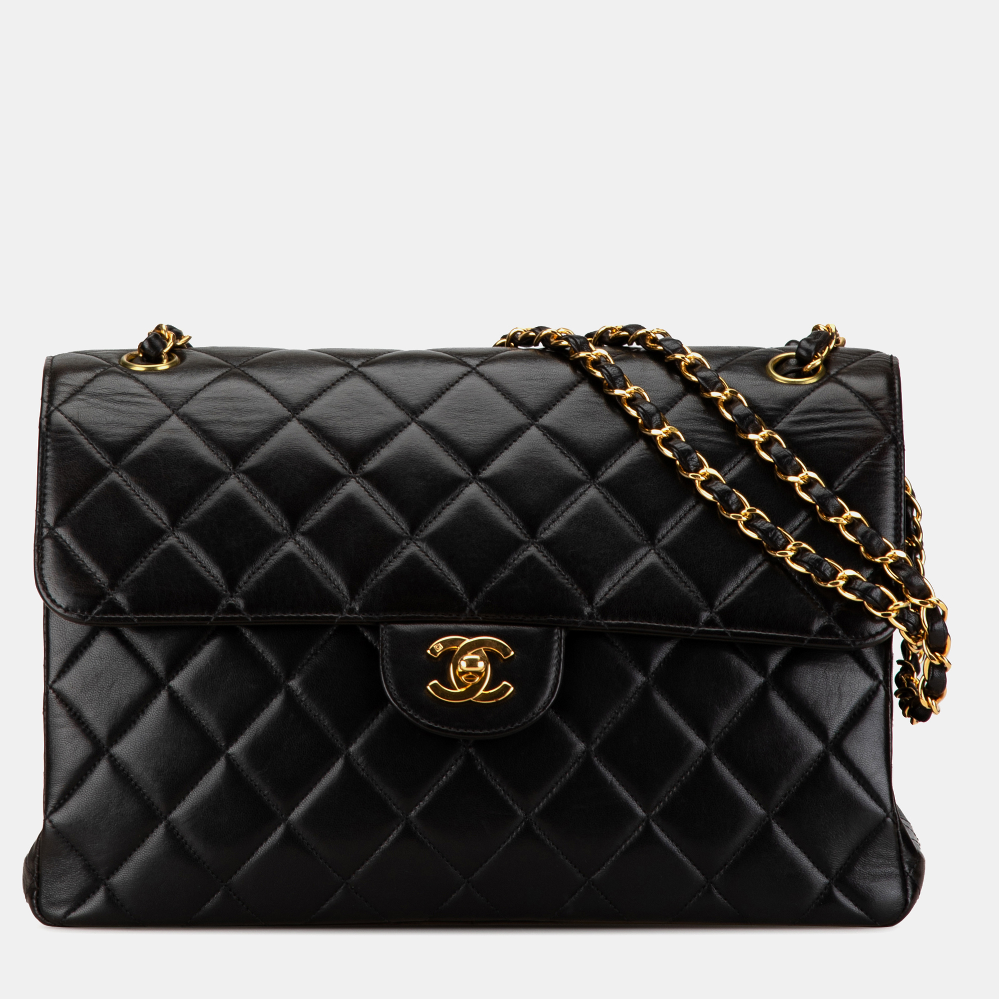 

Chanel Black Jumbo Lambskin Double Sided Flap Bag