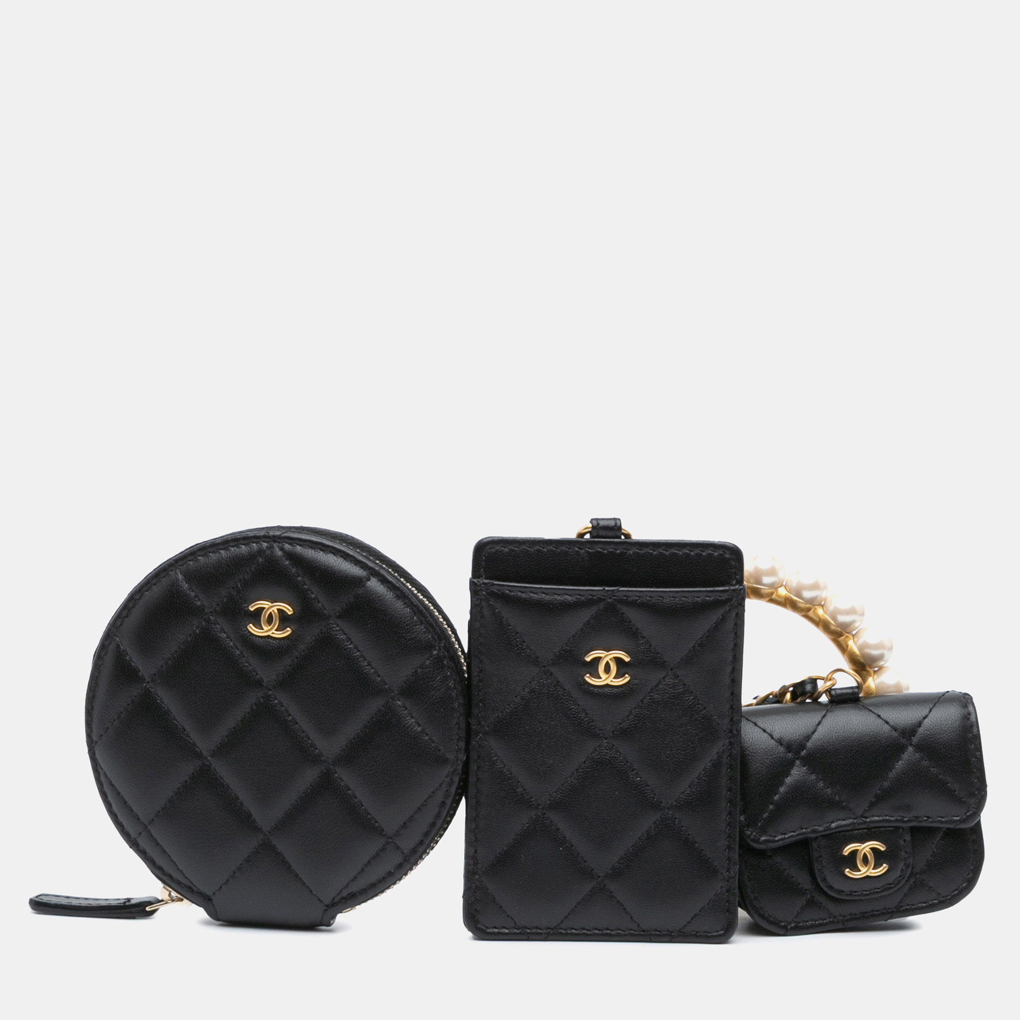 

Chanel Black Lambskin Pearl Crown CC Wristlet Multi Pouches