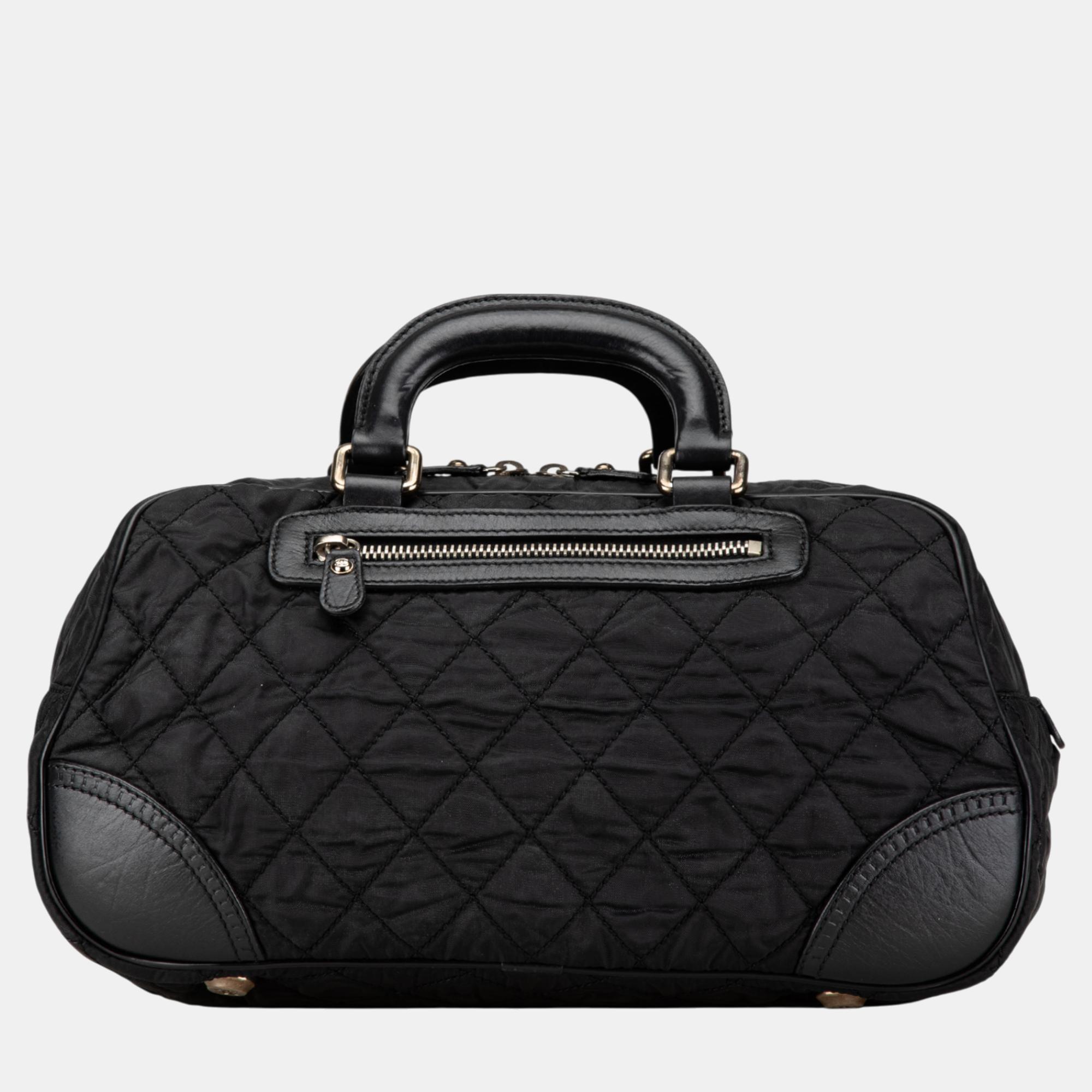 

Chanel Black Paris New York Quilted Nylon Duffle Handbag