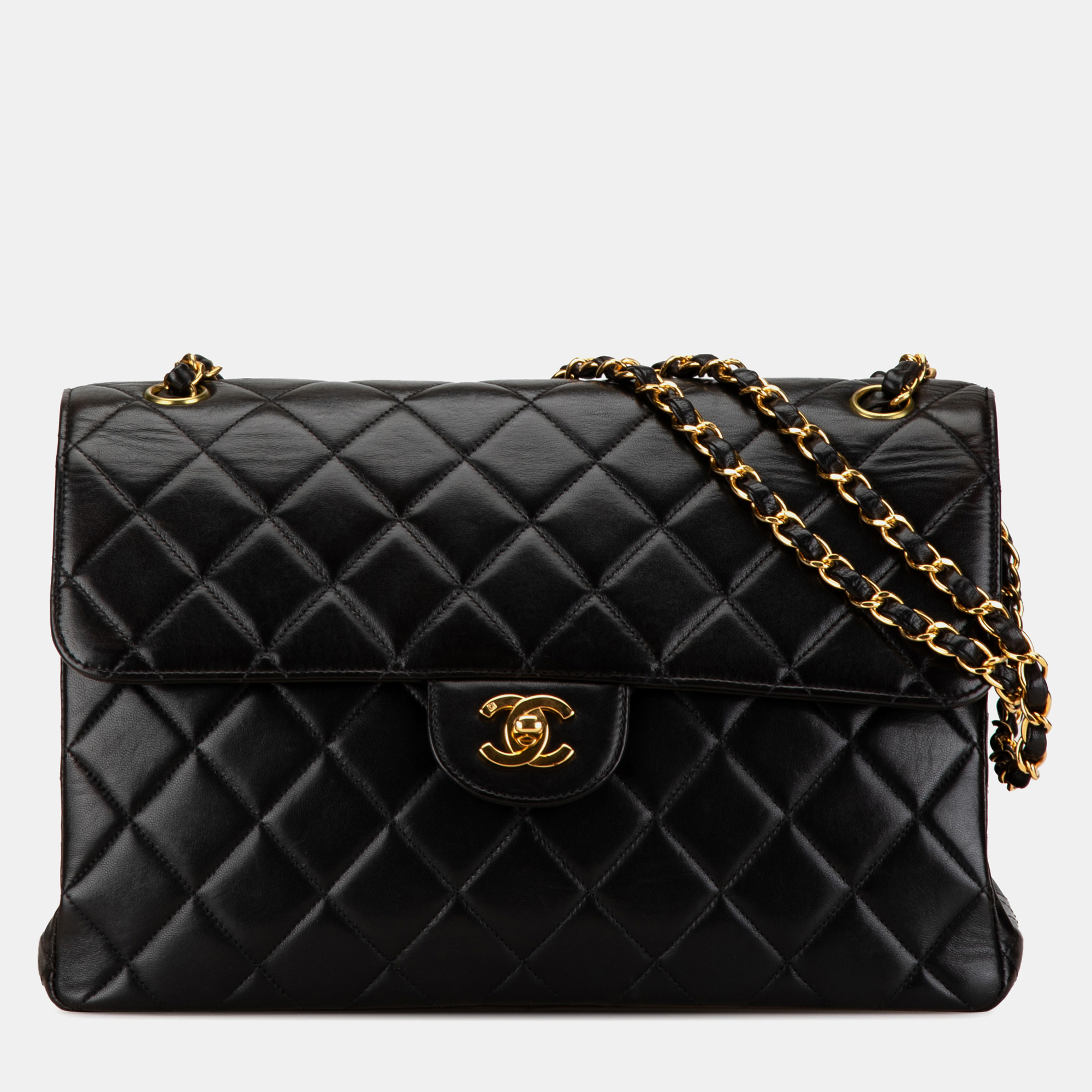 

Chanel Black Jumbo Lambskin Double Sided Flap