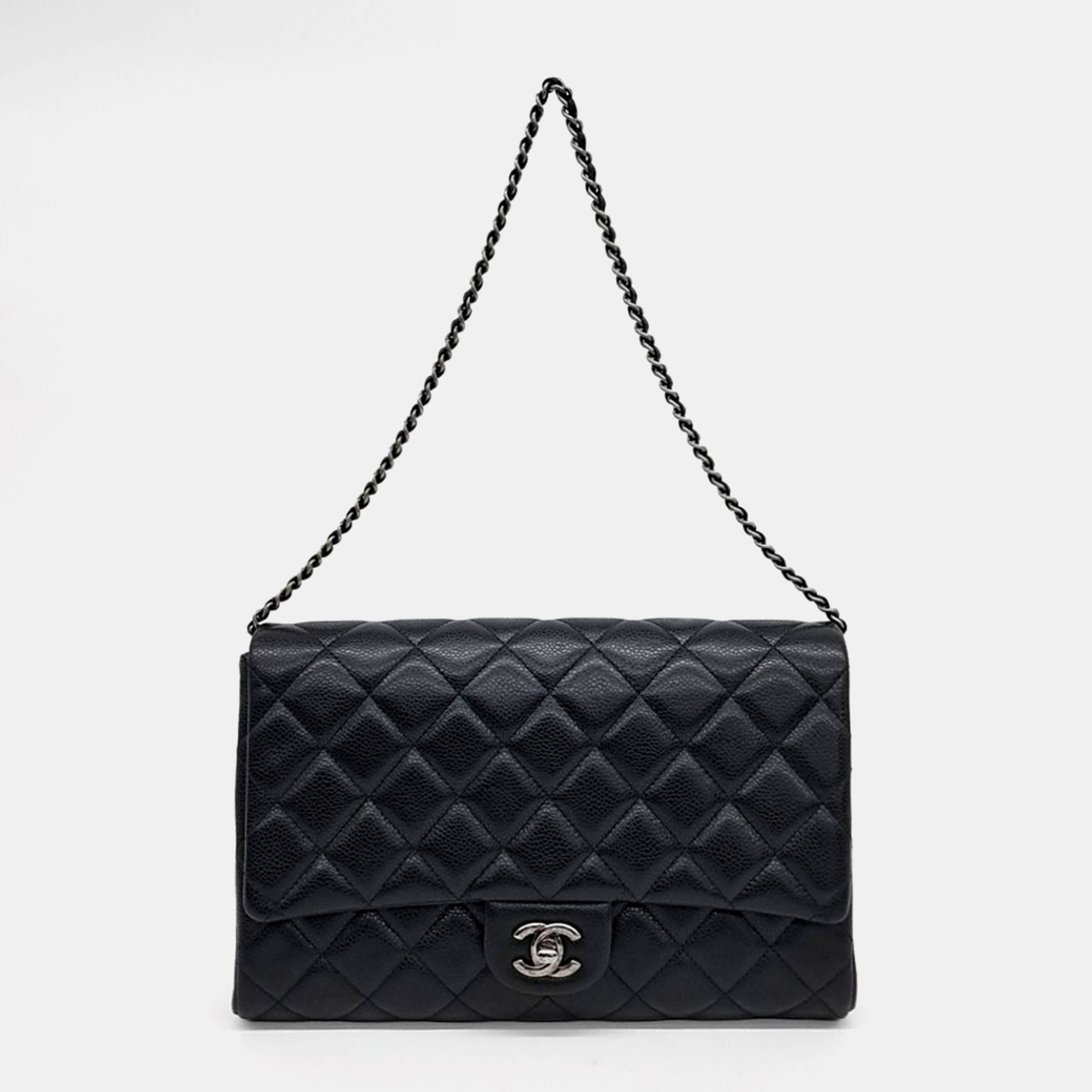

Chanel Black Leather caviar clutch and shoulder bag