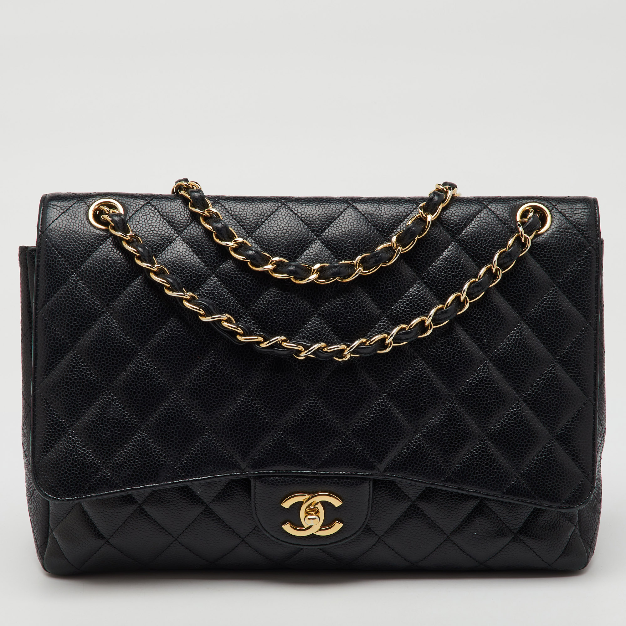 

Chanel Black Quilted Caviar Leather Maxi Classic Single Flap Bag