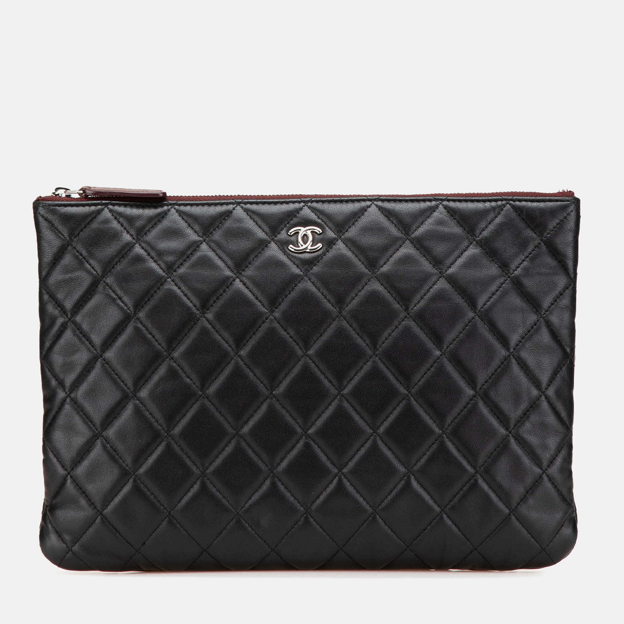 

Chanel Black Medium Quilted Lambskin O Case Clutch